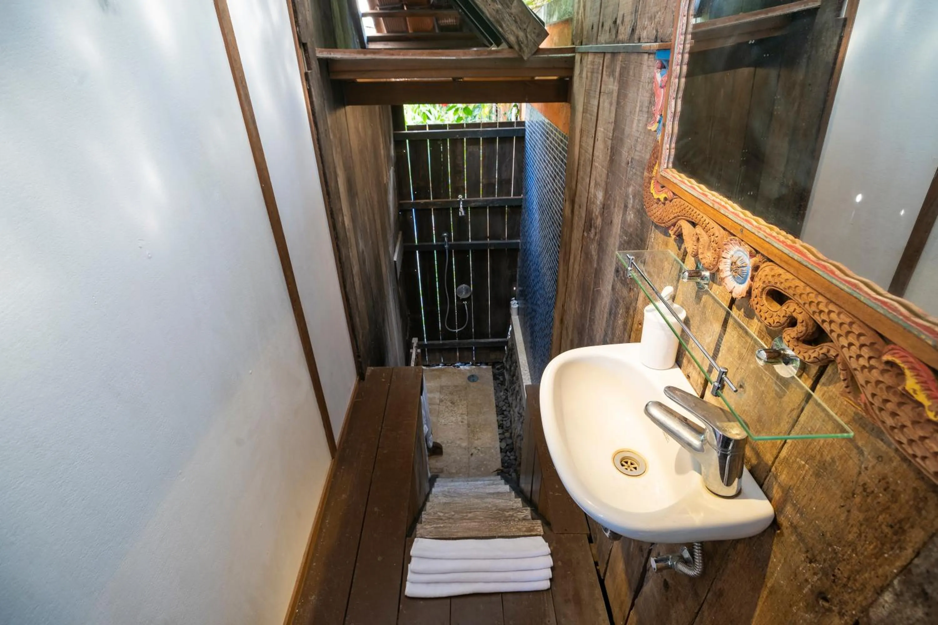Bathroom in Amed Lodge by Sudamala Resorts