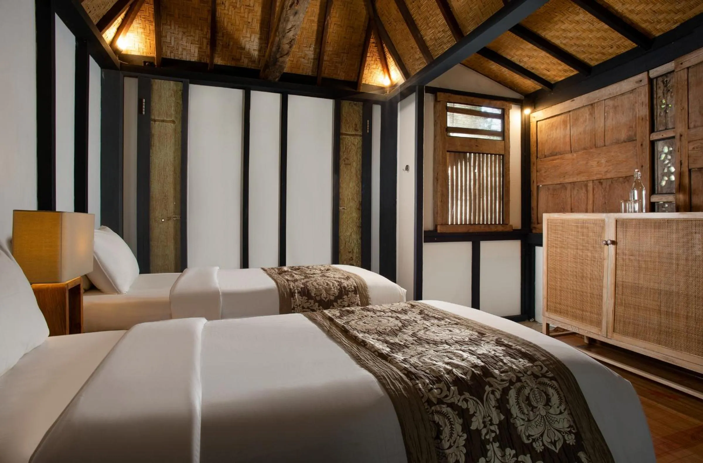 Bedroom, Bed in Amed Lodge by Sudamala Resorts