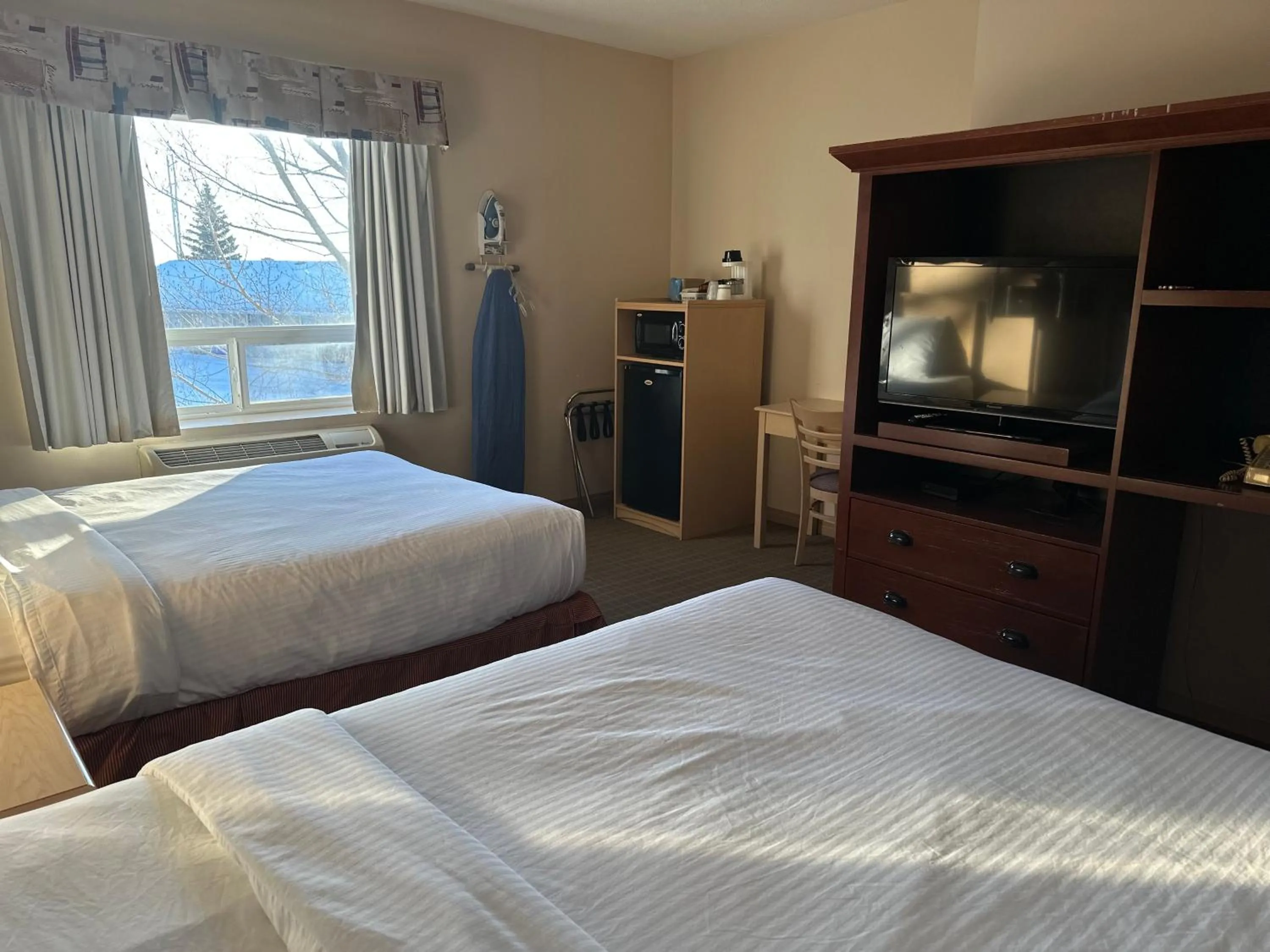 Bed in Lone Star Hotel