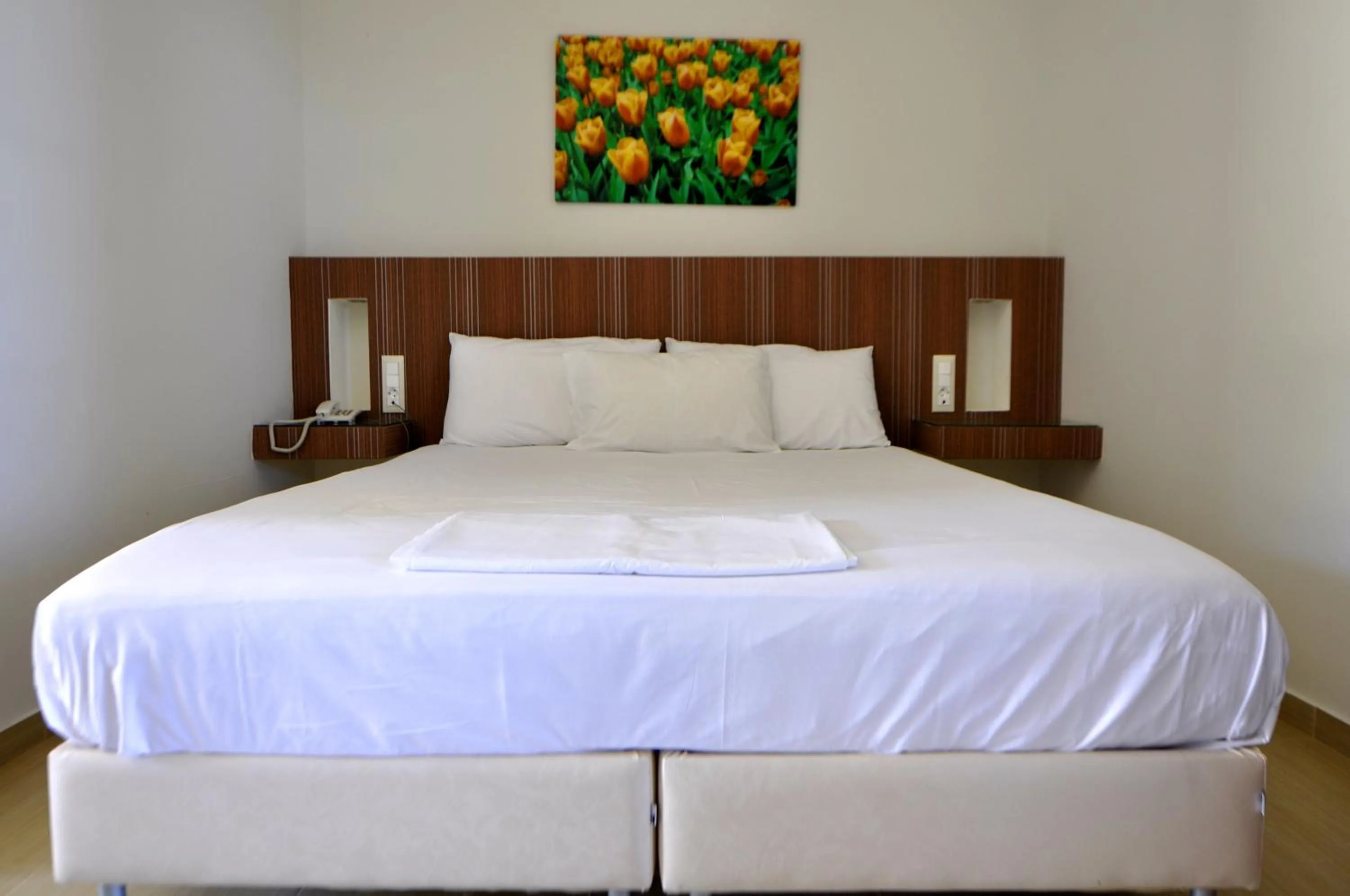 Bed in Tony's Beach Hotel