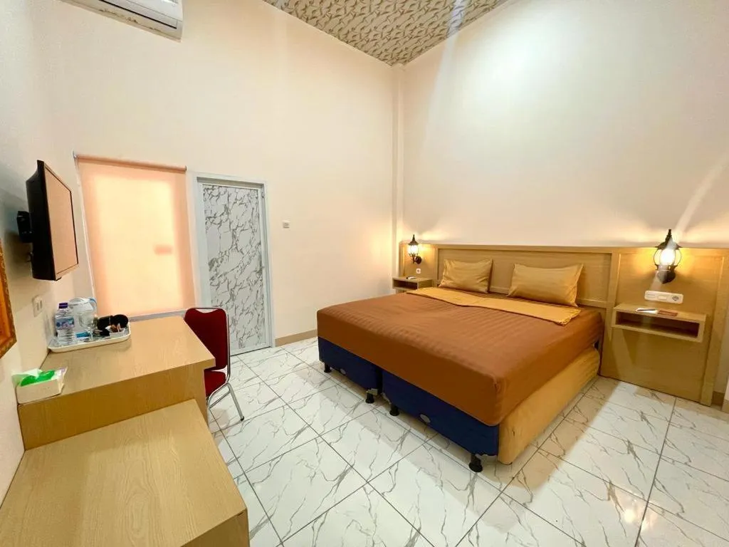 Bed in Grand Town Hotel Mandai