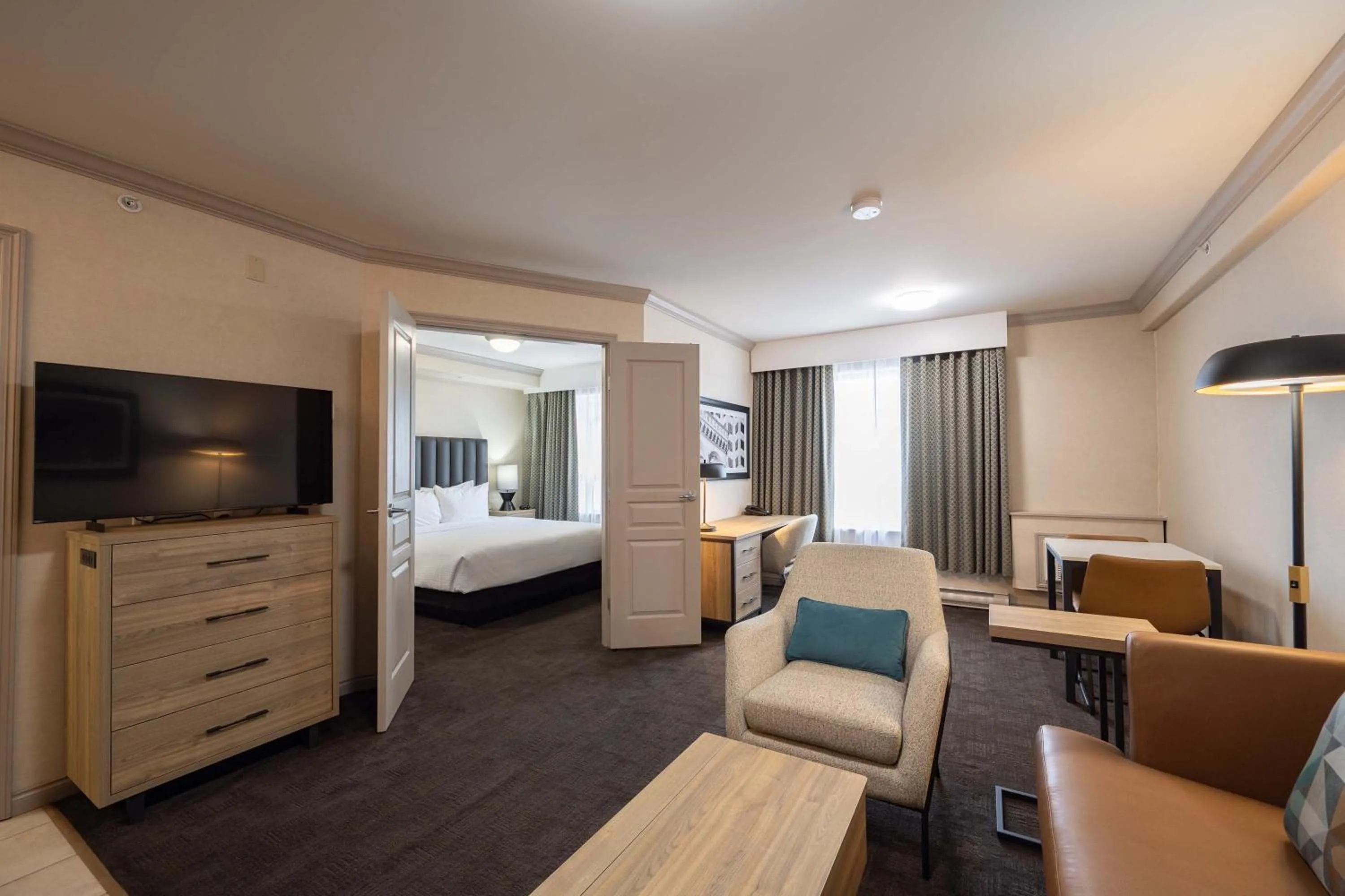 Photo of the whole room, Bed in Sandman Hotel & Suites Winnipeg Airport