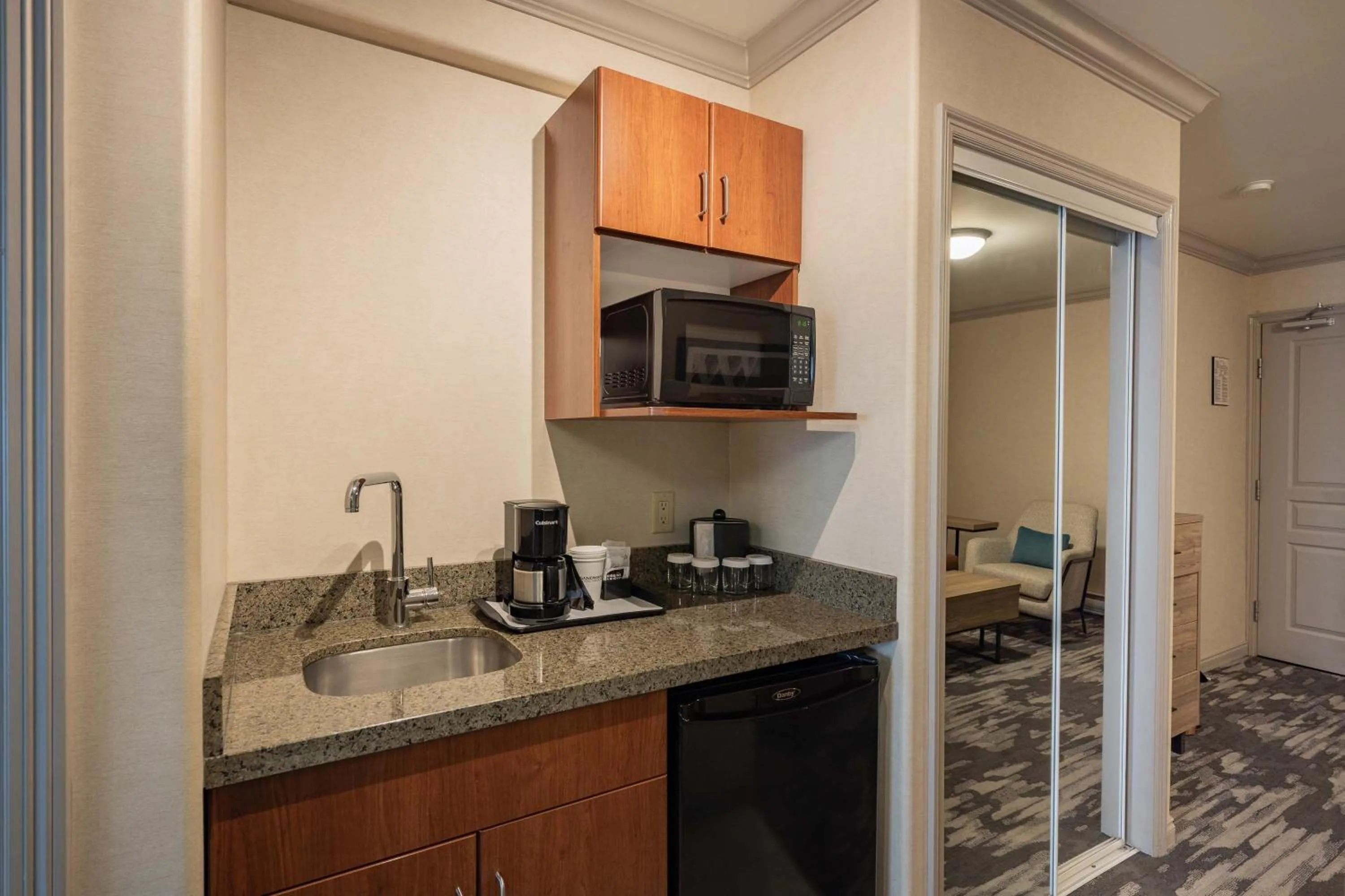 Kitchen or kitchenette in Sandman Hotel & Suites Winnipeg Airport