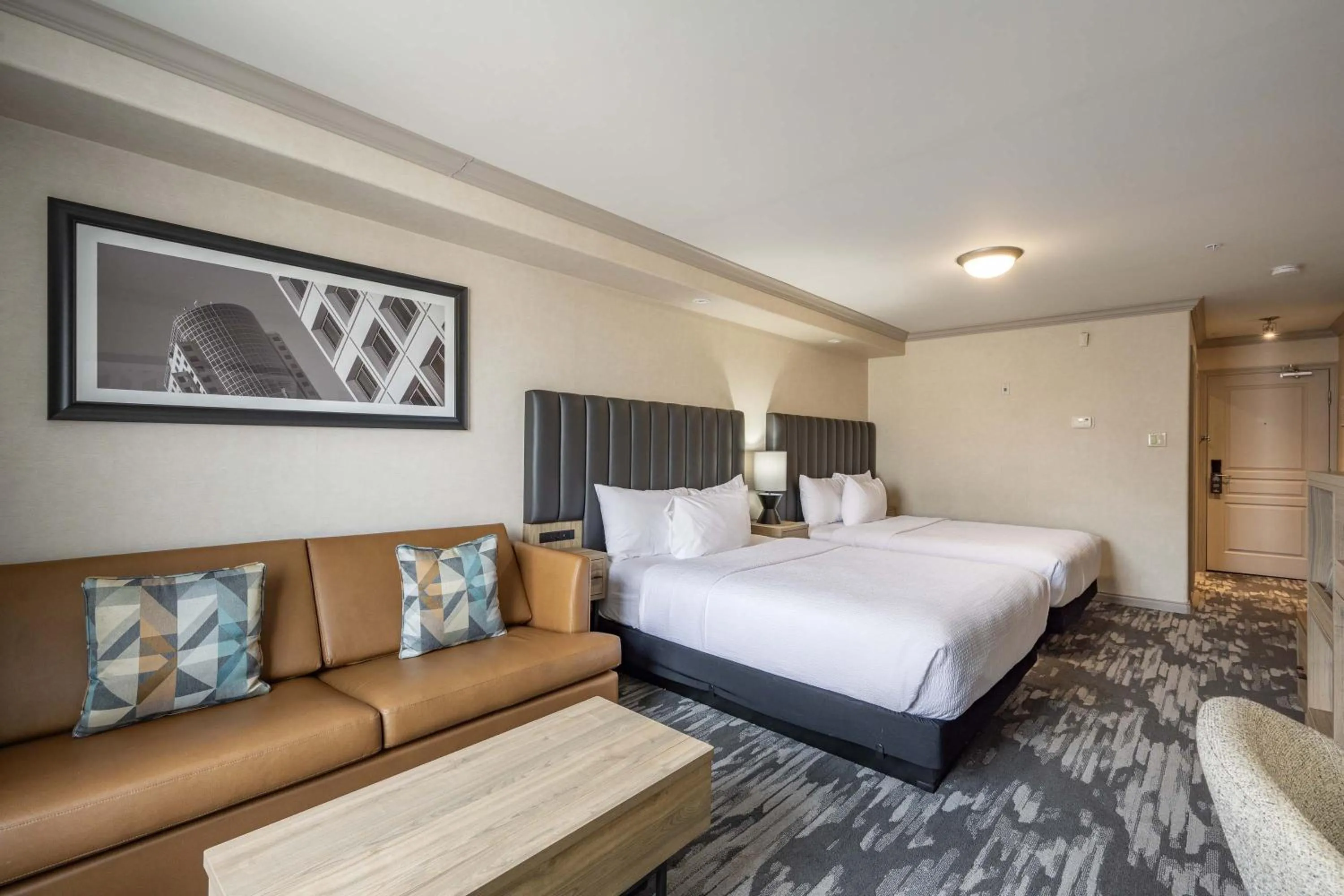 Photo of the whole room, Bed in Sandman Hotel & Suites Winnipeg Airport