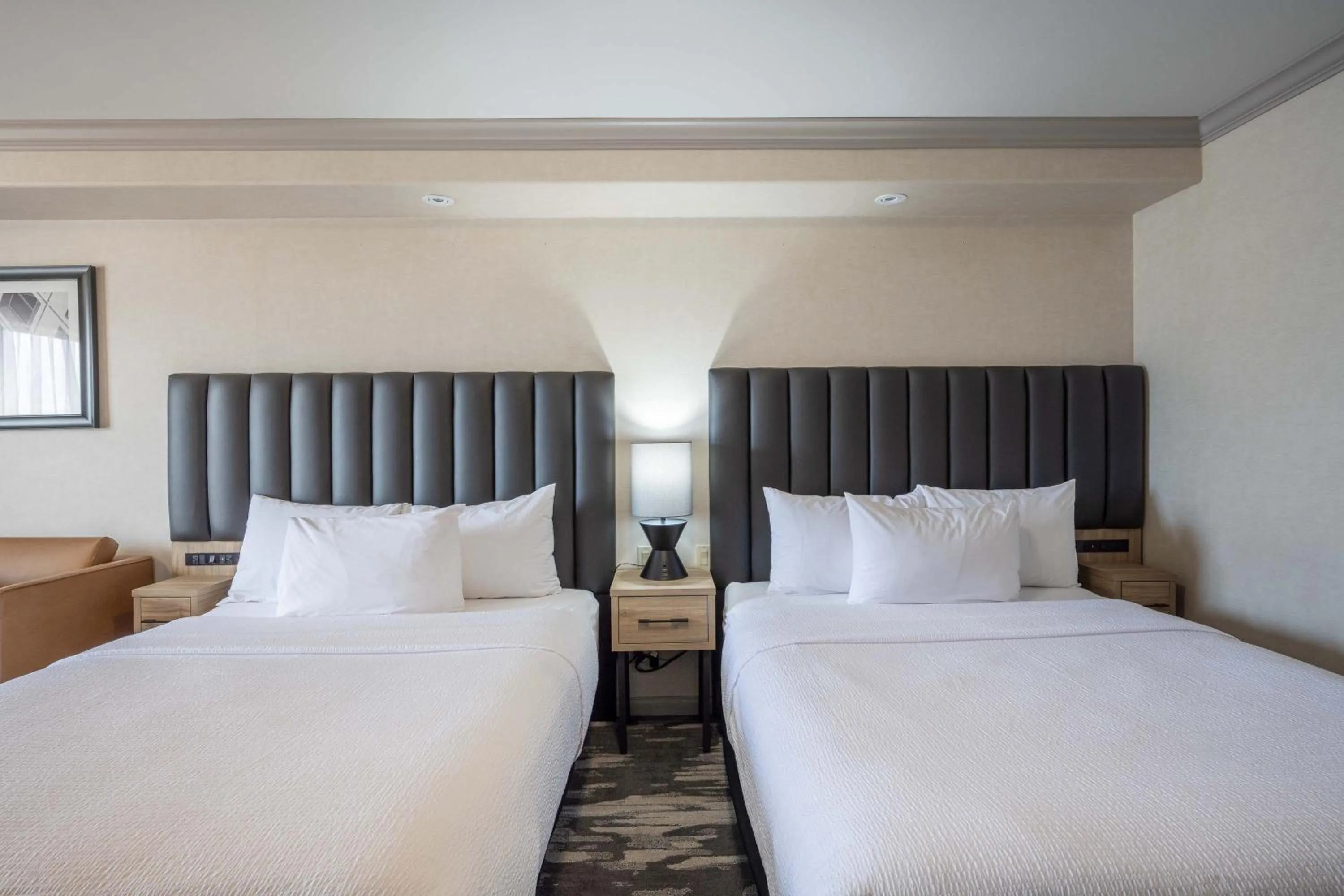 Photo of the whole room, Bed in Sandman Hotel & Suites Winnipeg Airport