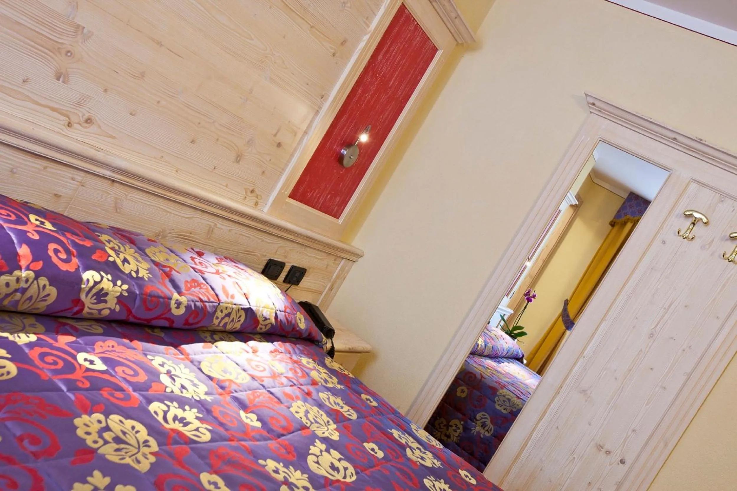 Decorative detail, Bed in Hotel Val Di Sole