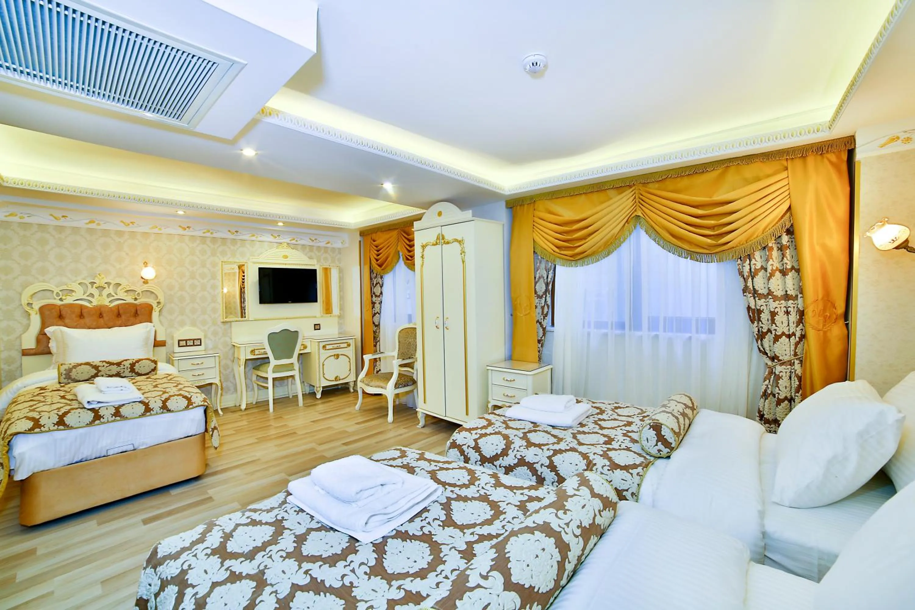 Photo of the whole room, Bed in Nayla Palace Hotel-Special Category