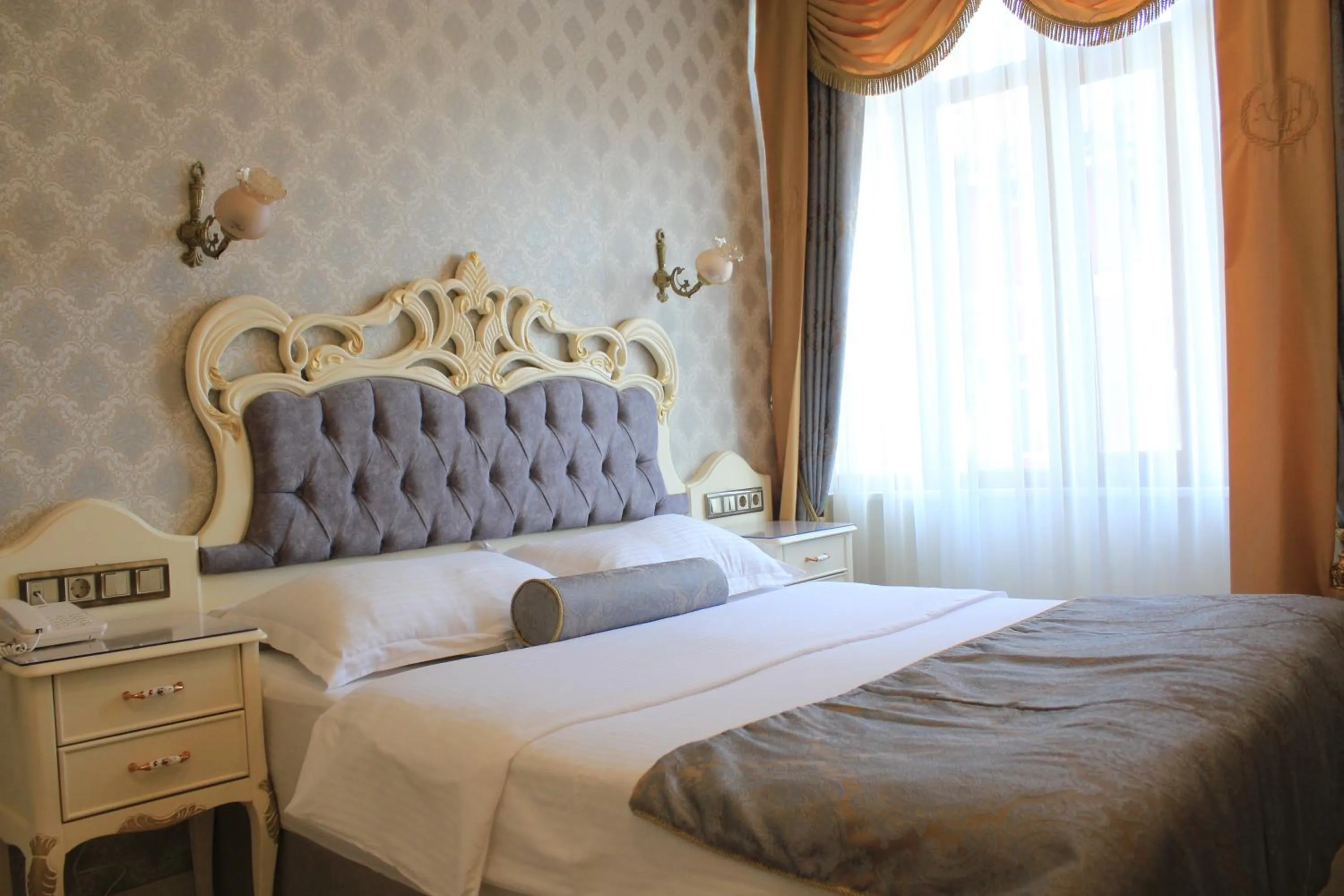 Photo of the whole room, Bed in Nayla Palace Hotel-Special Category