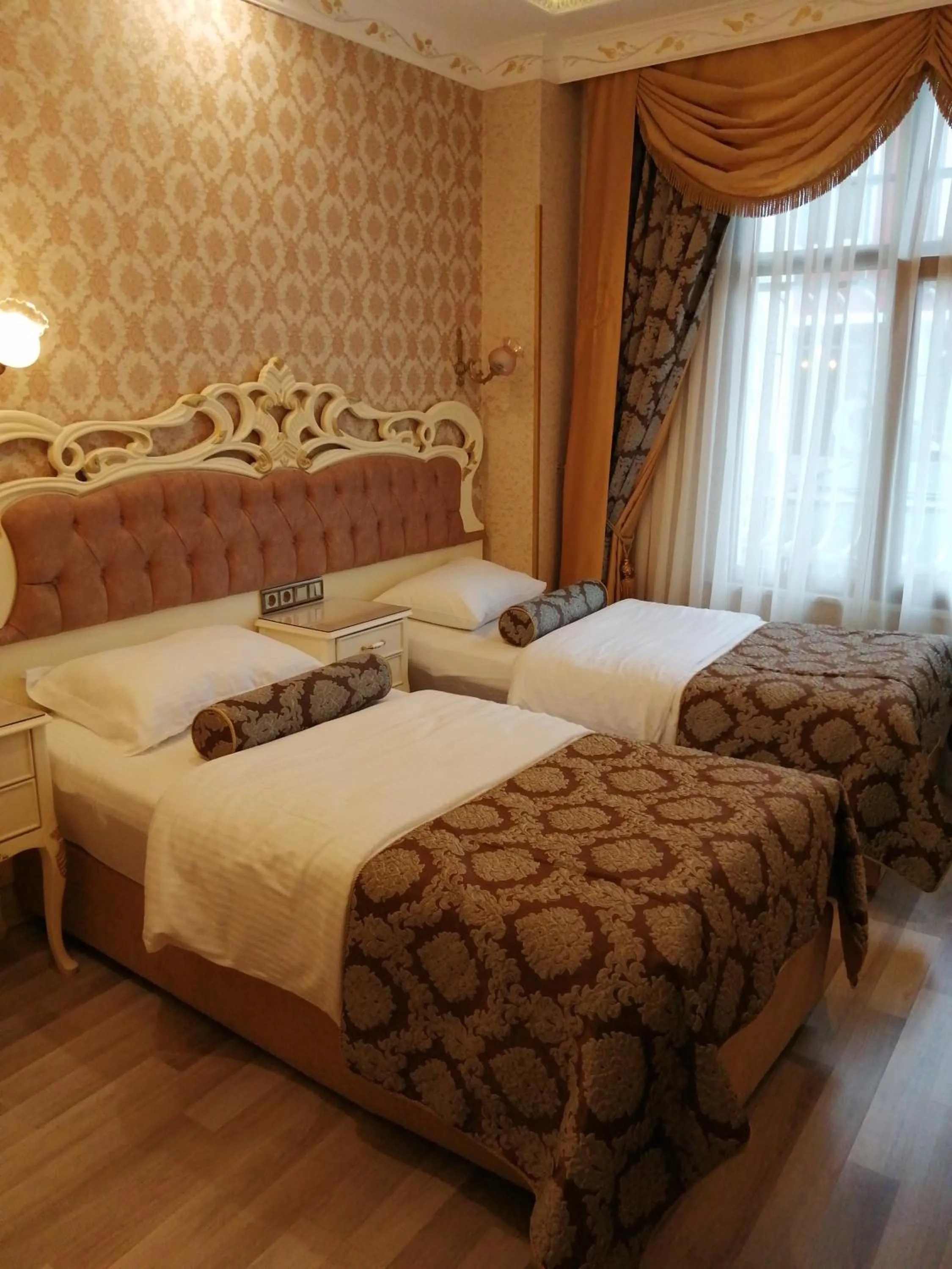 Photo of the whole room, Bed in Nayla Palace Hotel-Special Category