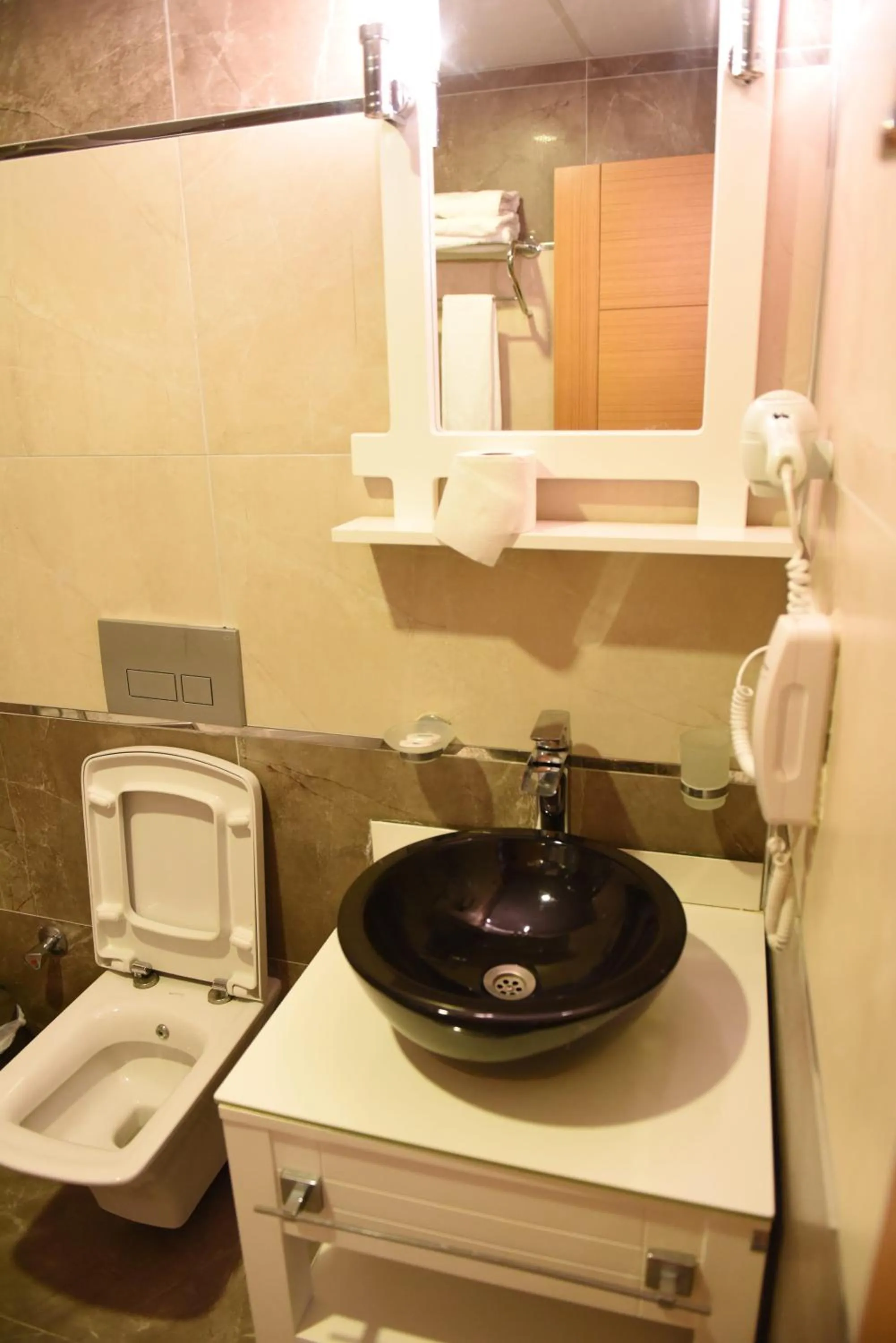 Toilet in Carpediem Diamond Hotel