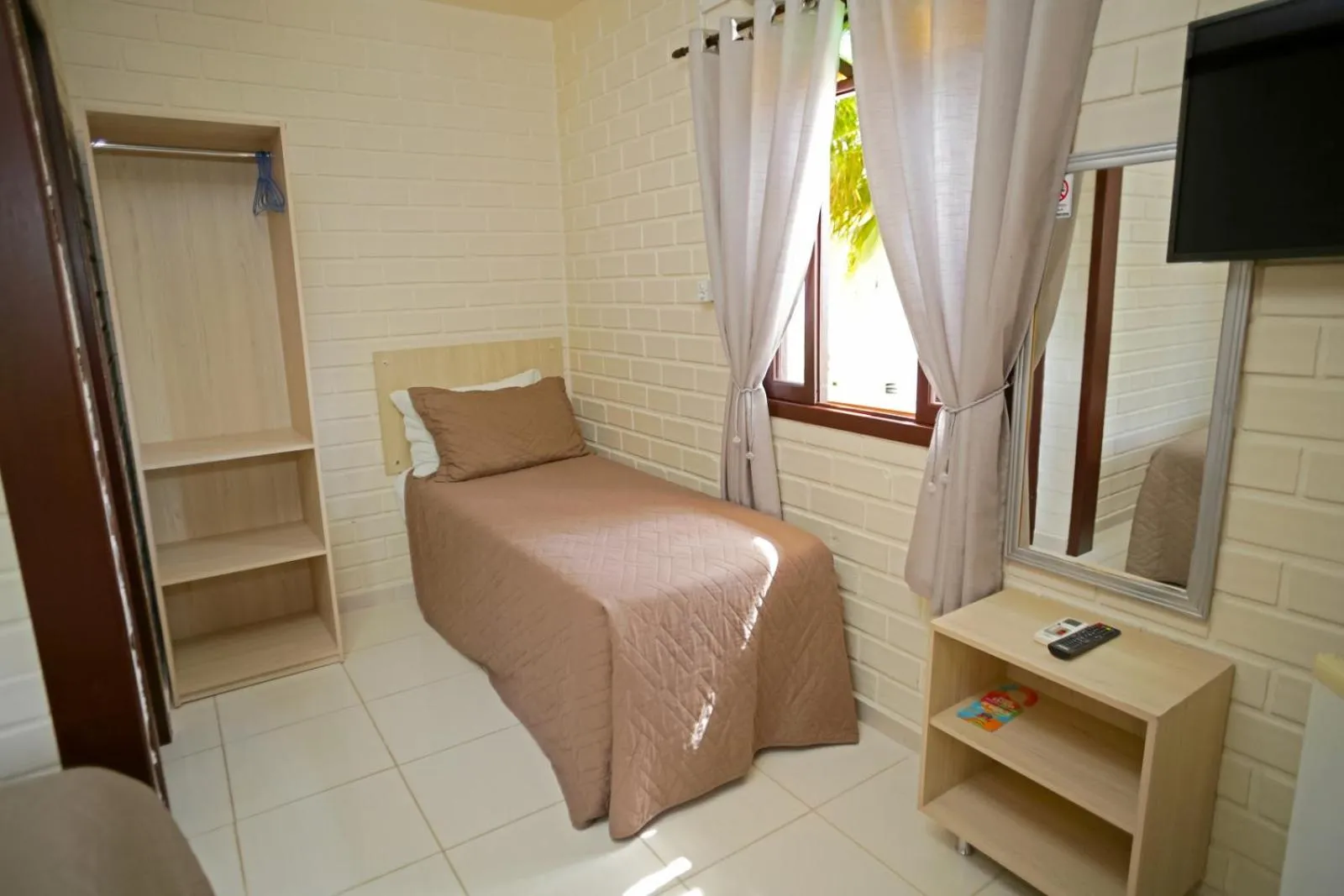 Bed in Pousada Magnus