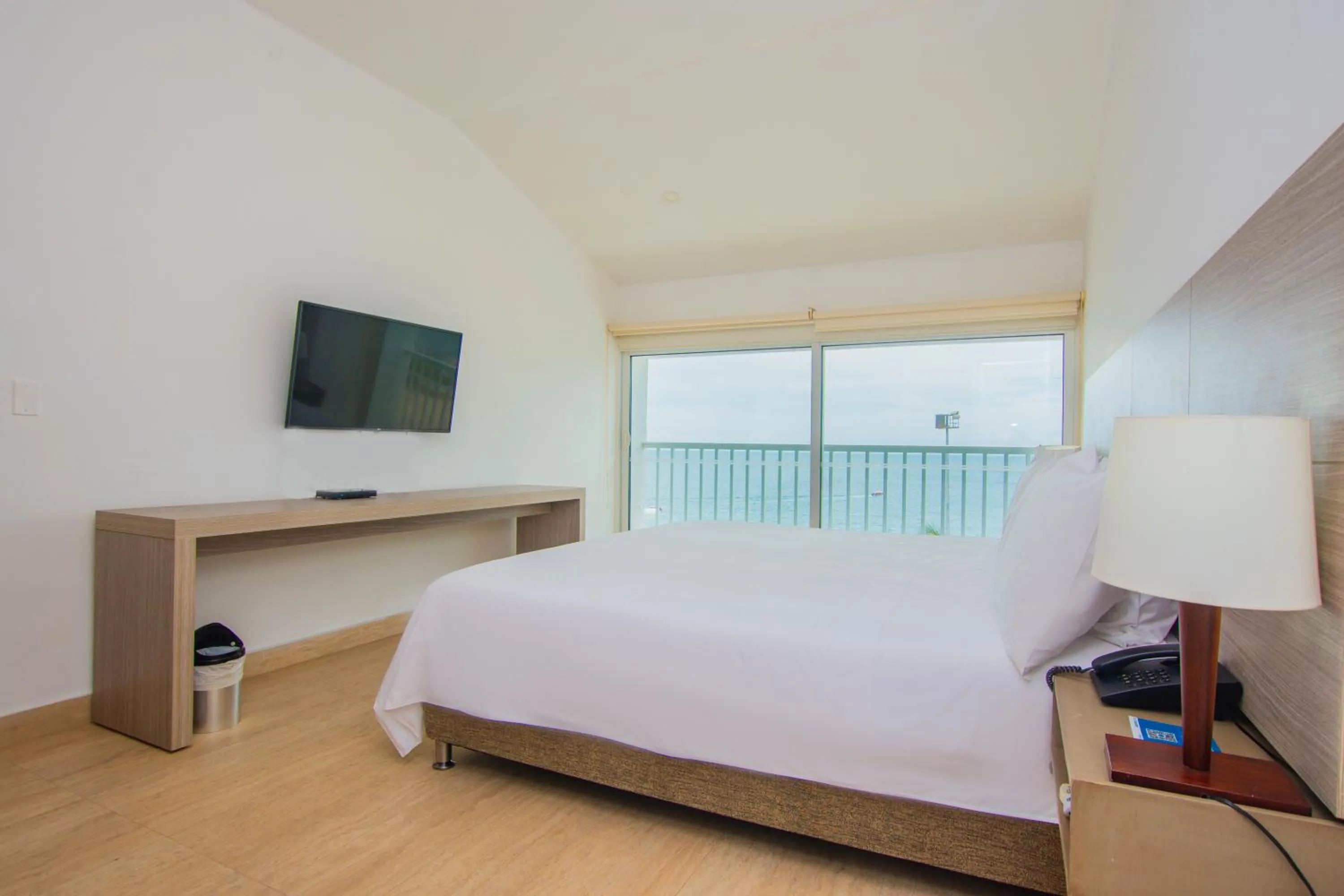 Photo of the whole room, Bed in Tamaca Beach Resort