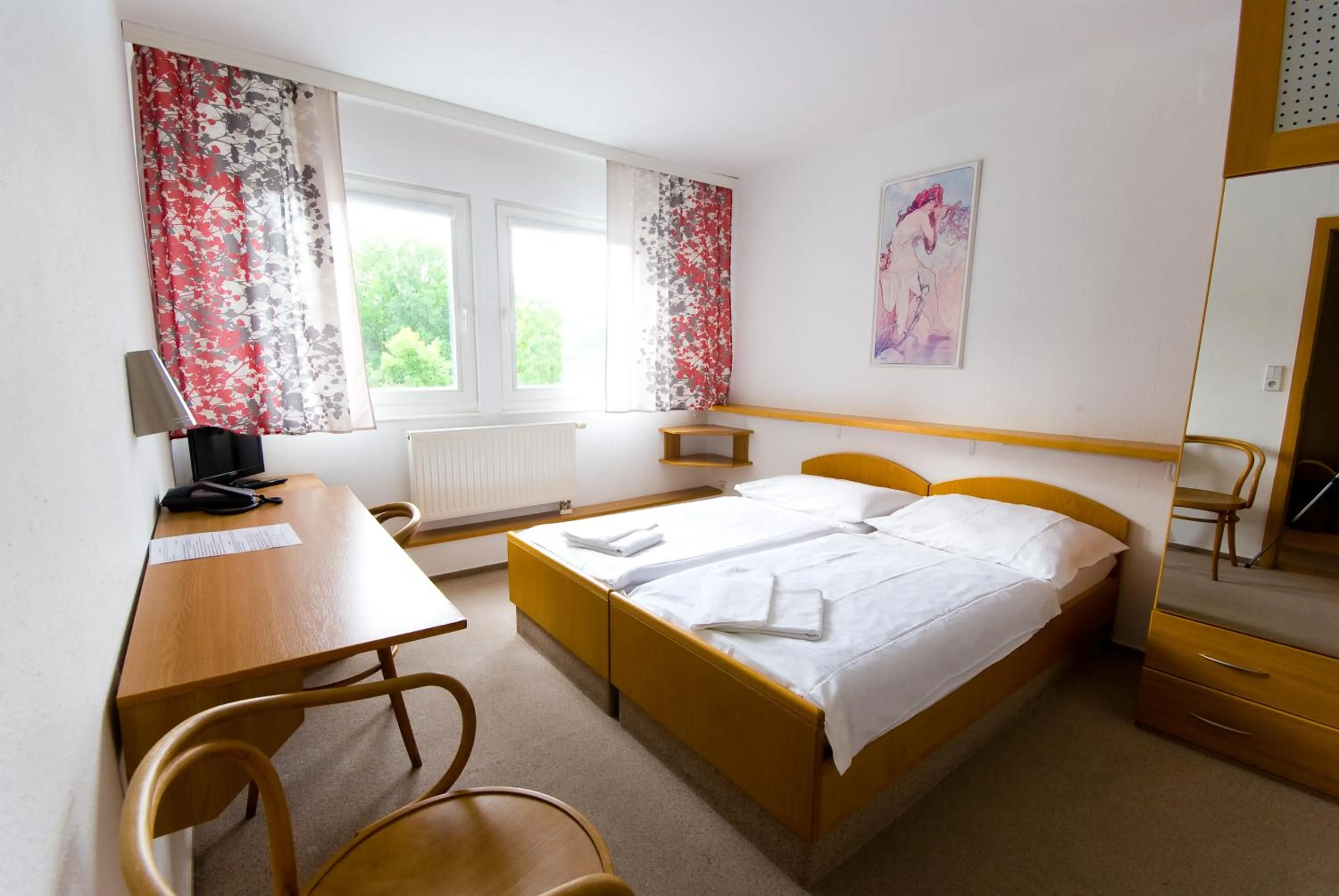 Bed in Hotel Smaragd