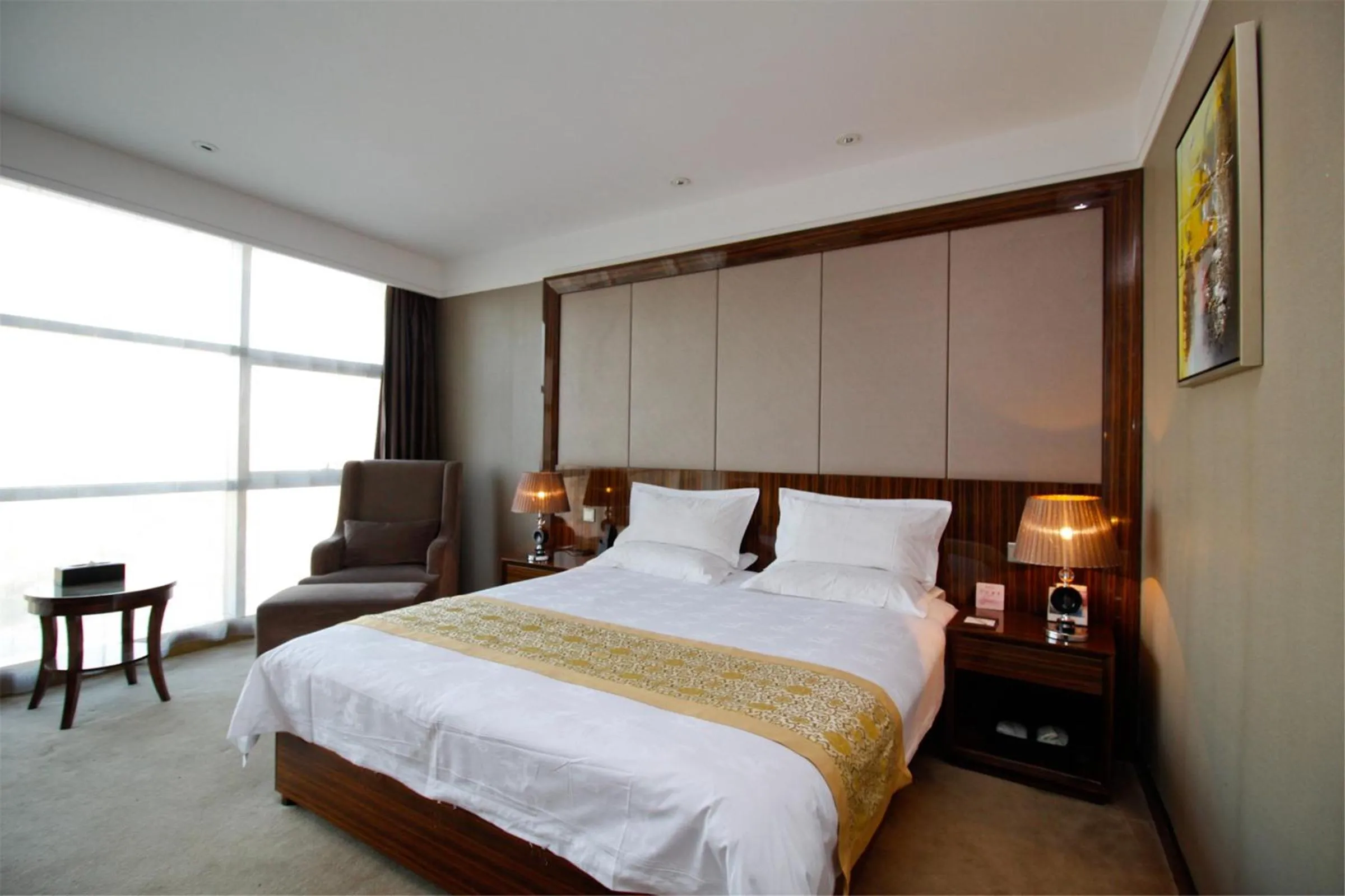 Bed in GreenTree Eastern Yancheng Binhai Oubaoliya City Square Hotel