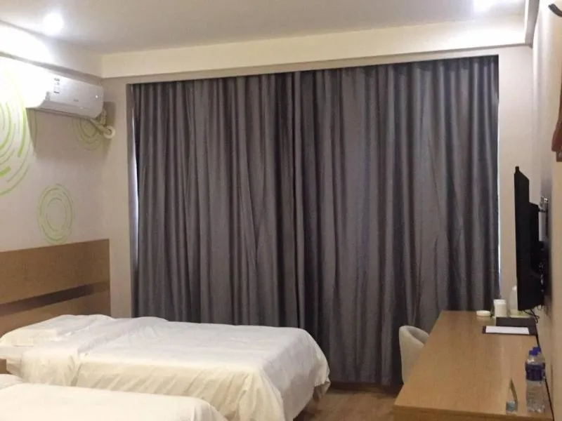 Bed in GreenTree Inn Lvliang Xiaoyi City Fuqian Street Hotel
