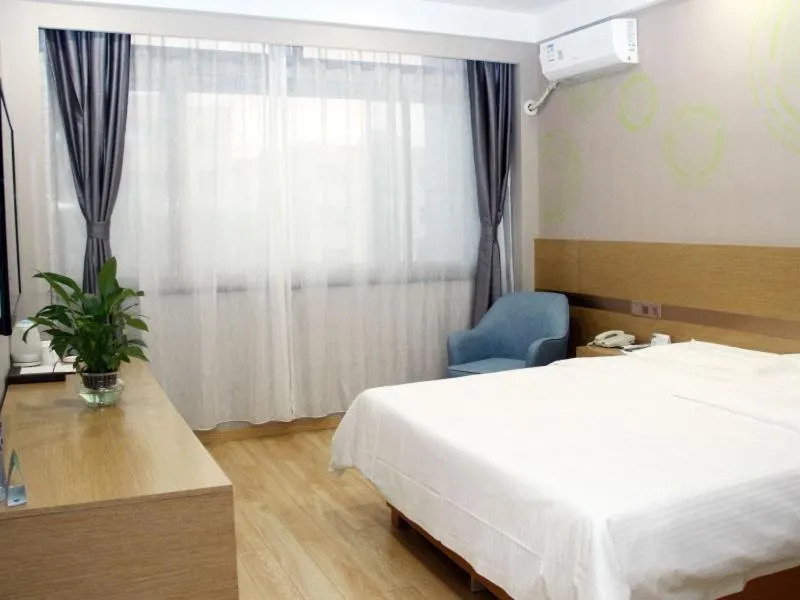 Bed in GreenTree Inn Lvliang Xiaoyi City Fuqian Street Hotel