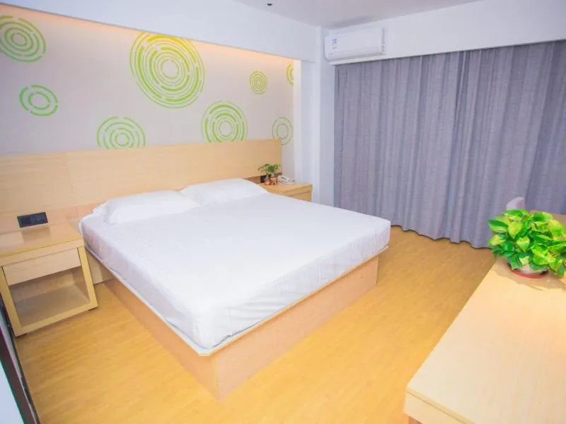 Bed in GreenTree Inn Yangzhou Jiangdu Xiaoji Town South Zhongxing Road Express Hotel