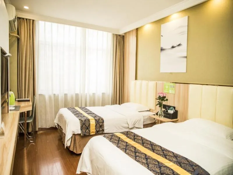 Bed in GreenTree Inn Jinhua Railway Station Express Hotel