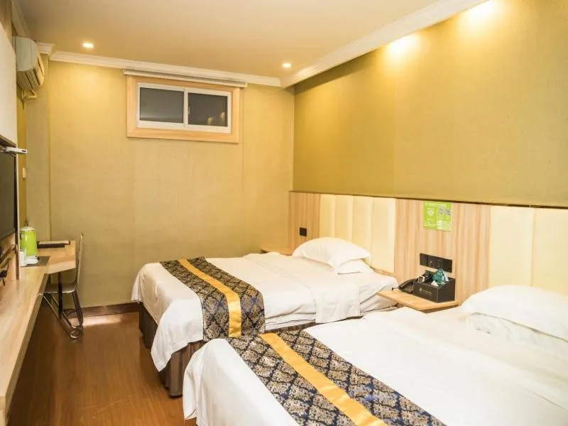 Bed in GreenTree Inn Jinhua Railway Station Express Hotel