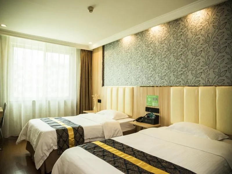 Bed in GreenTree Inn Jinhua Railway Station Express Hotel