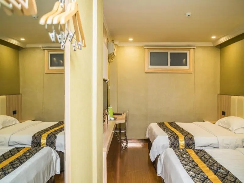 Bed in GreenTree Inn Jinhua Railway Station Express Hotel