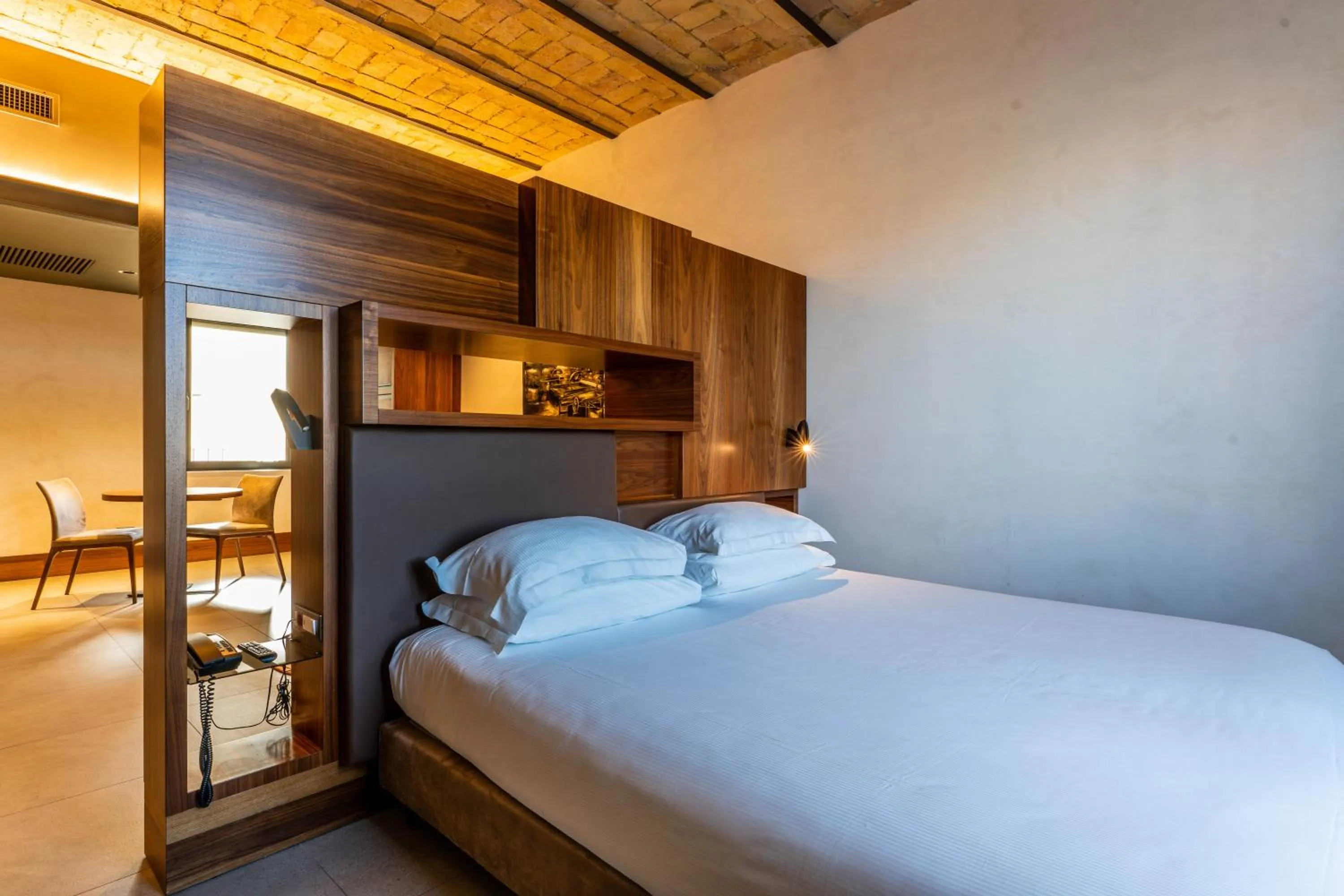 Bed in Gasometer Urban Suites