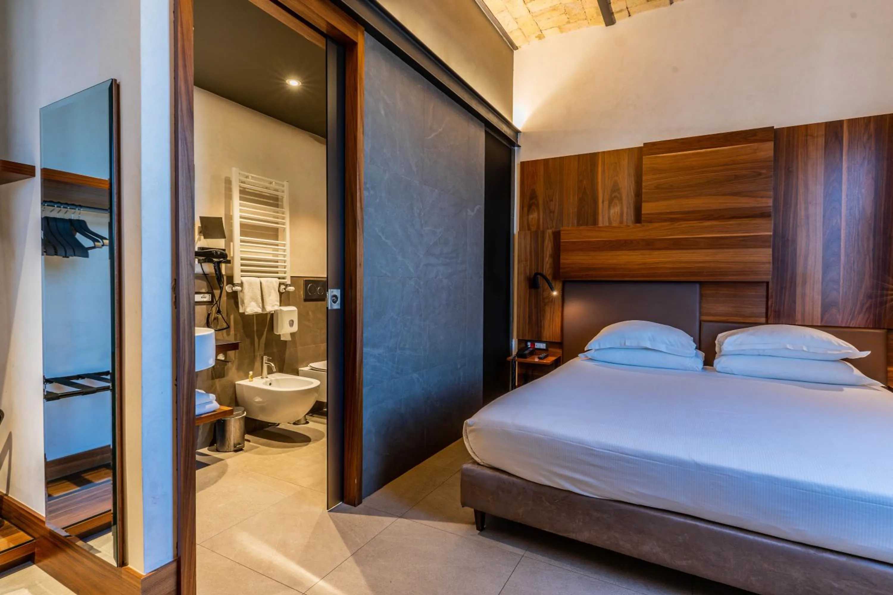 Bathroom, Bed in Gasometer Urban Suites