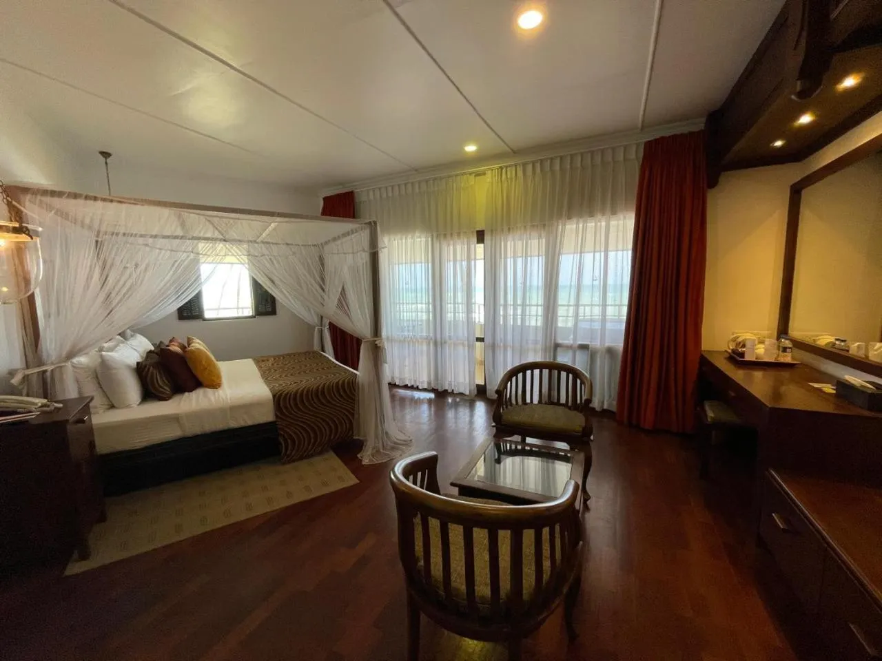 Bed in Tangerine Beach Hotel