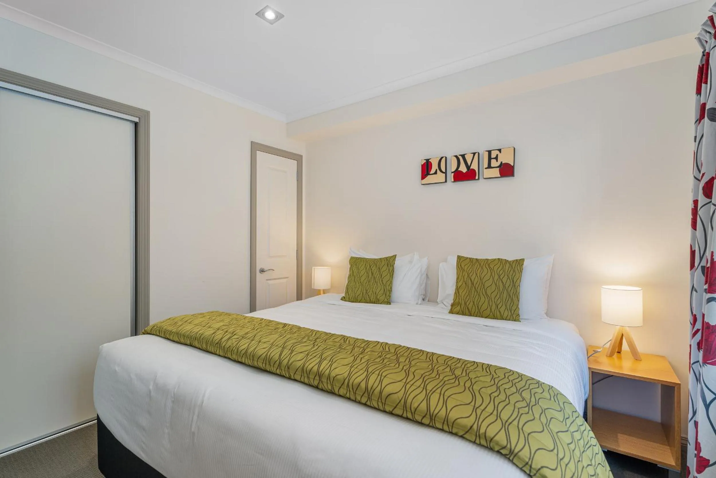 Bed in Crow's Nest Apartments