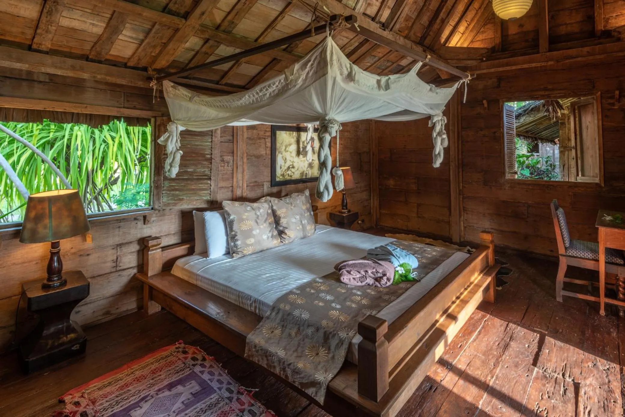 Bed in Ratua Private Island Resort