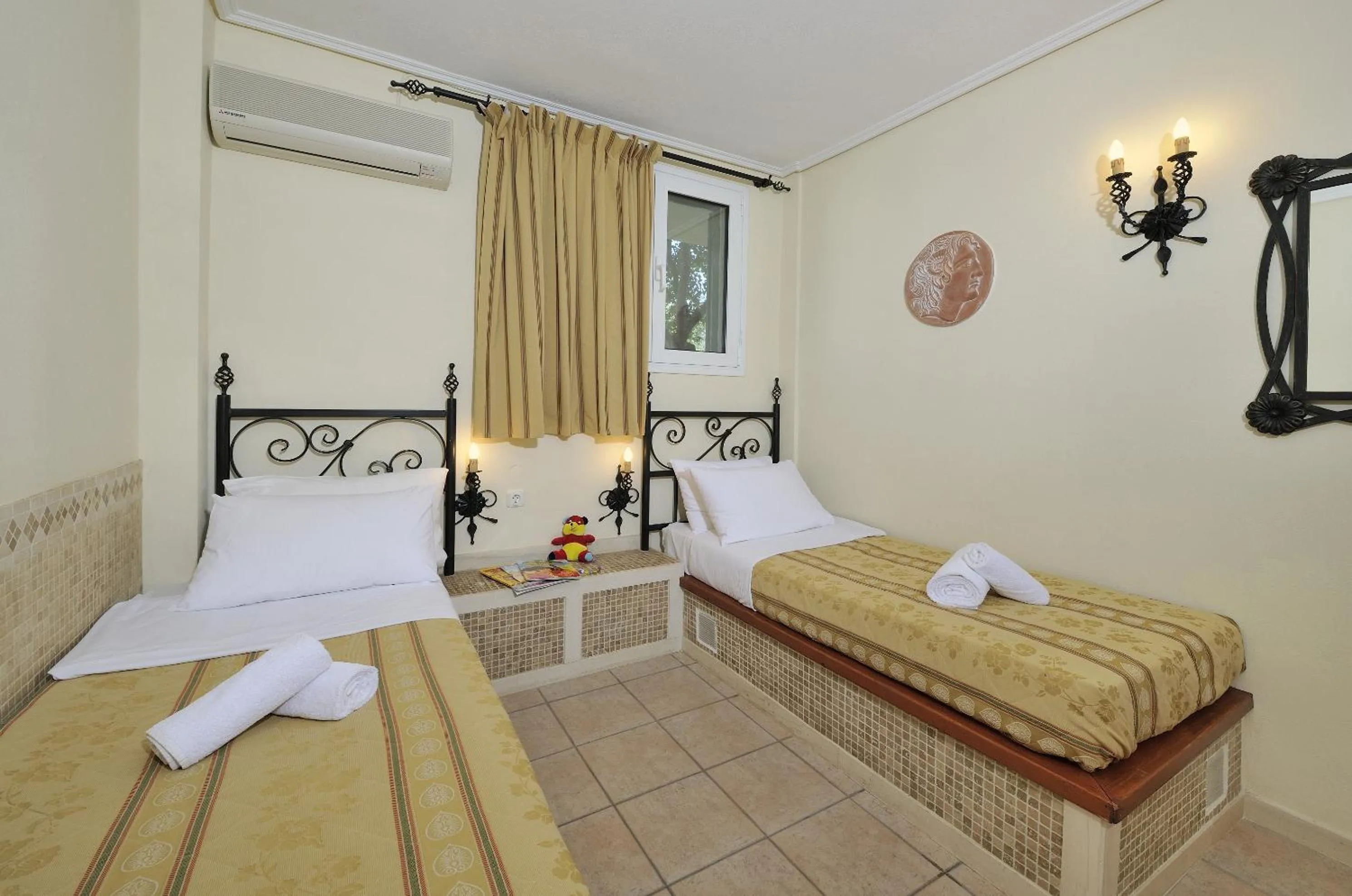 Bed in Paris Village Apartments