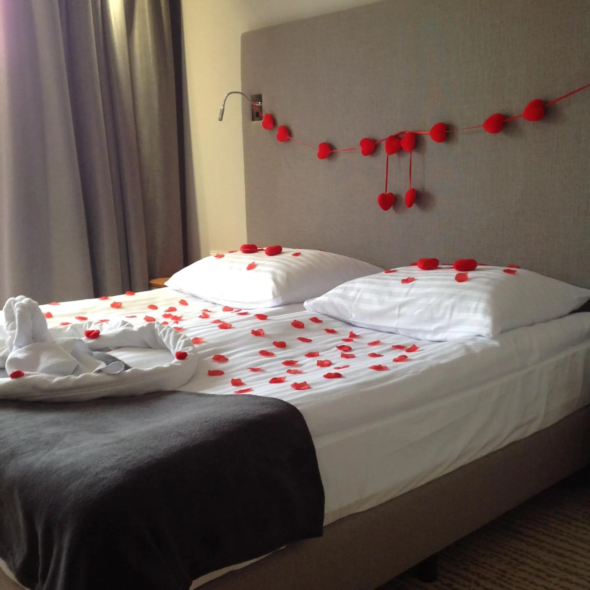 Bed in SeaPark Hotel Wellness & Spa