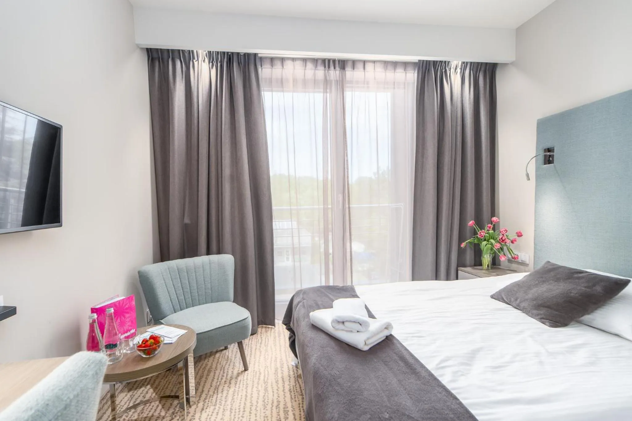 Bed in SeaPark Hotel Wellness & Spa