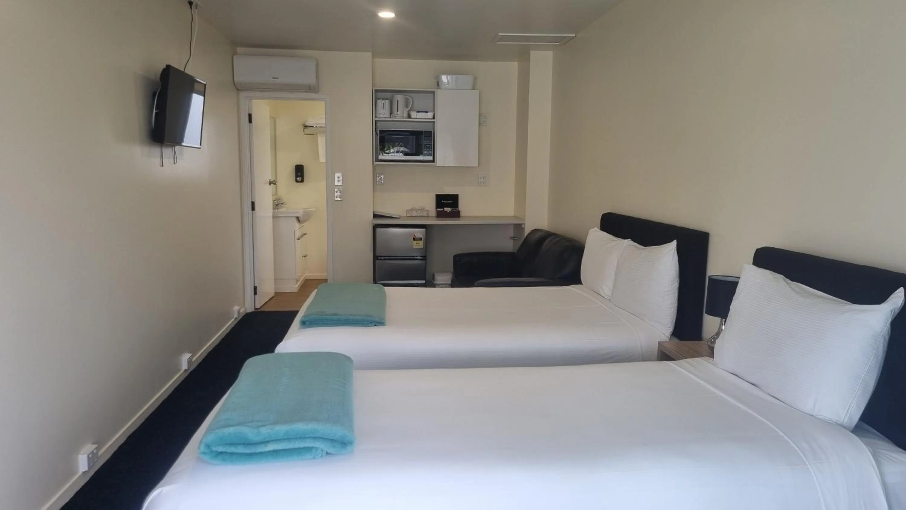 Bed in Twin Coast Adventures