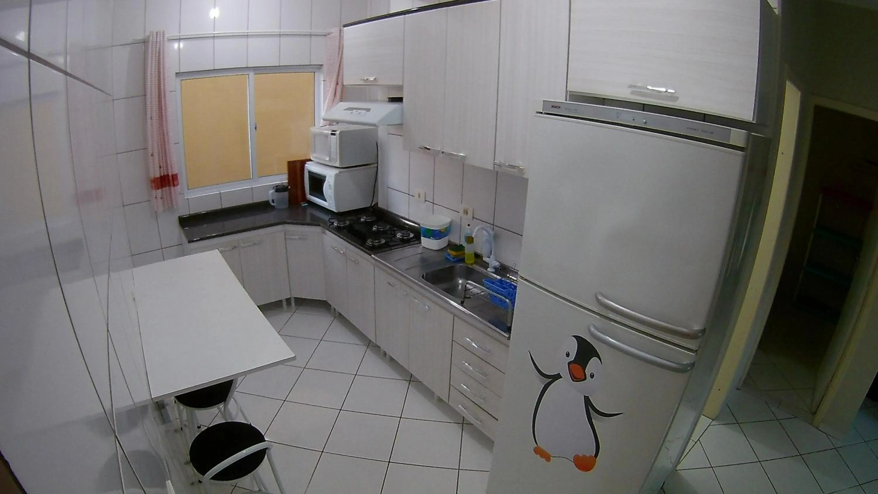 Kitchen or kitchenette in Apartamento Guaratuba