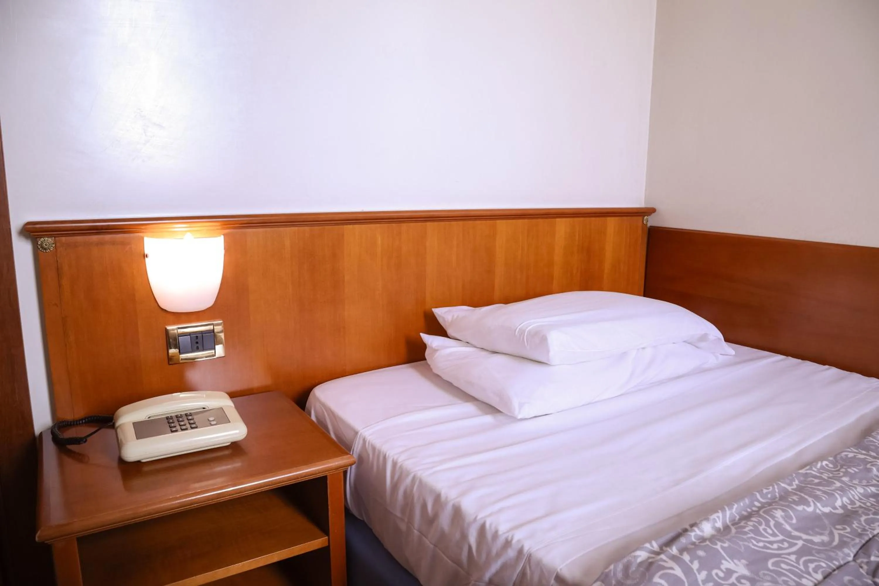 Bed in Hotel Villa Sara