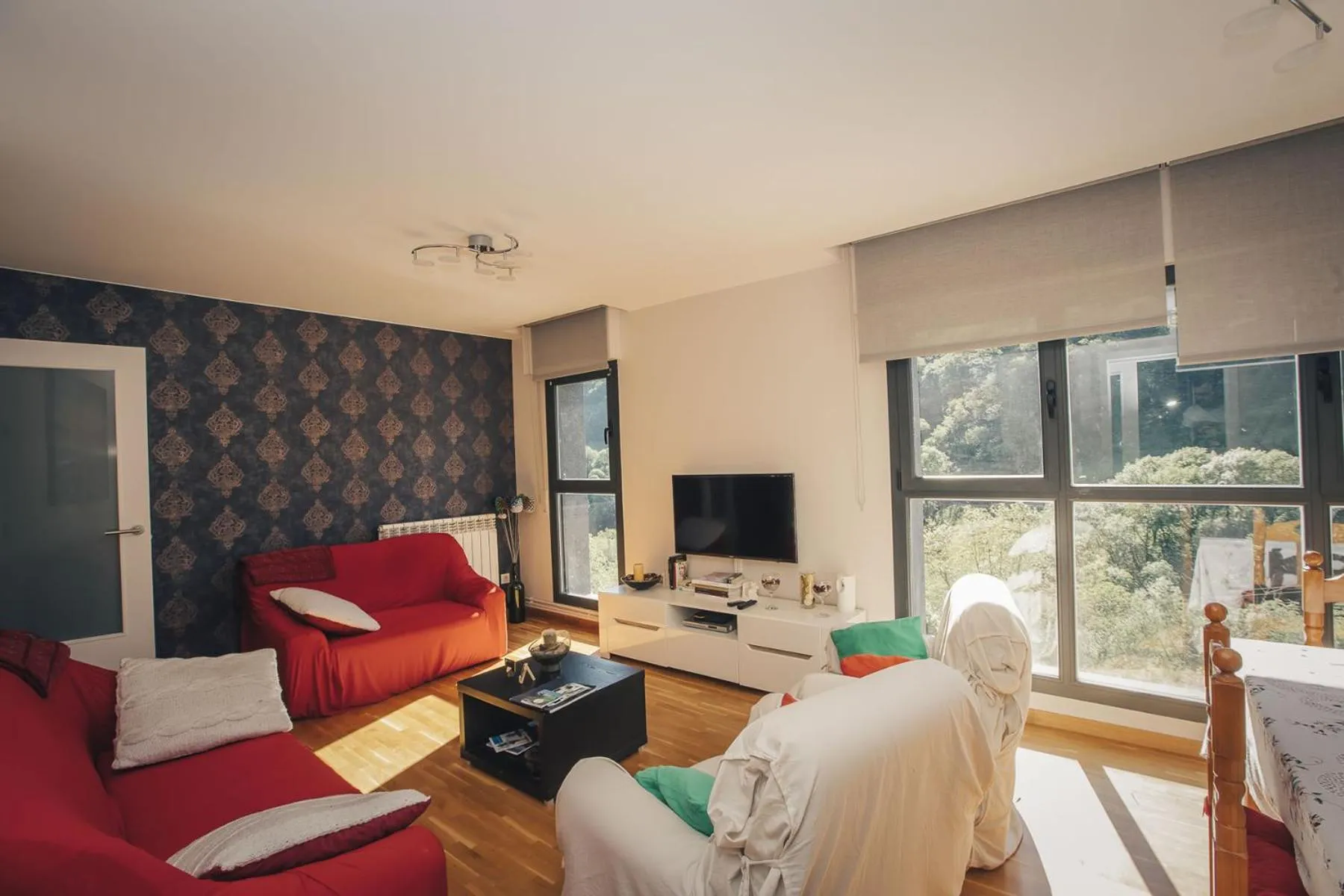 Seating area in Casa Ferran, amplias habitaciones y apartamentos de montaña