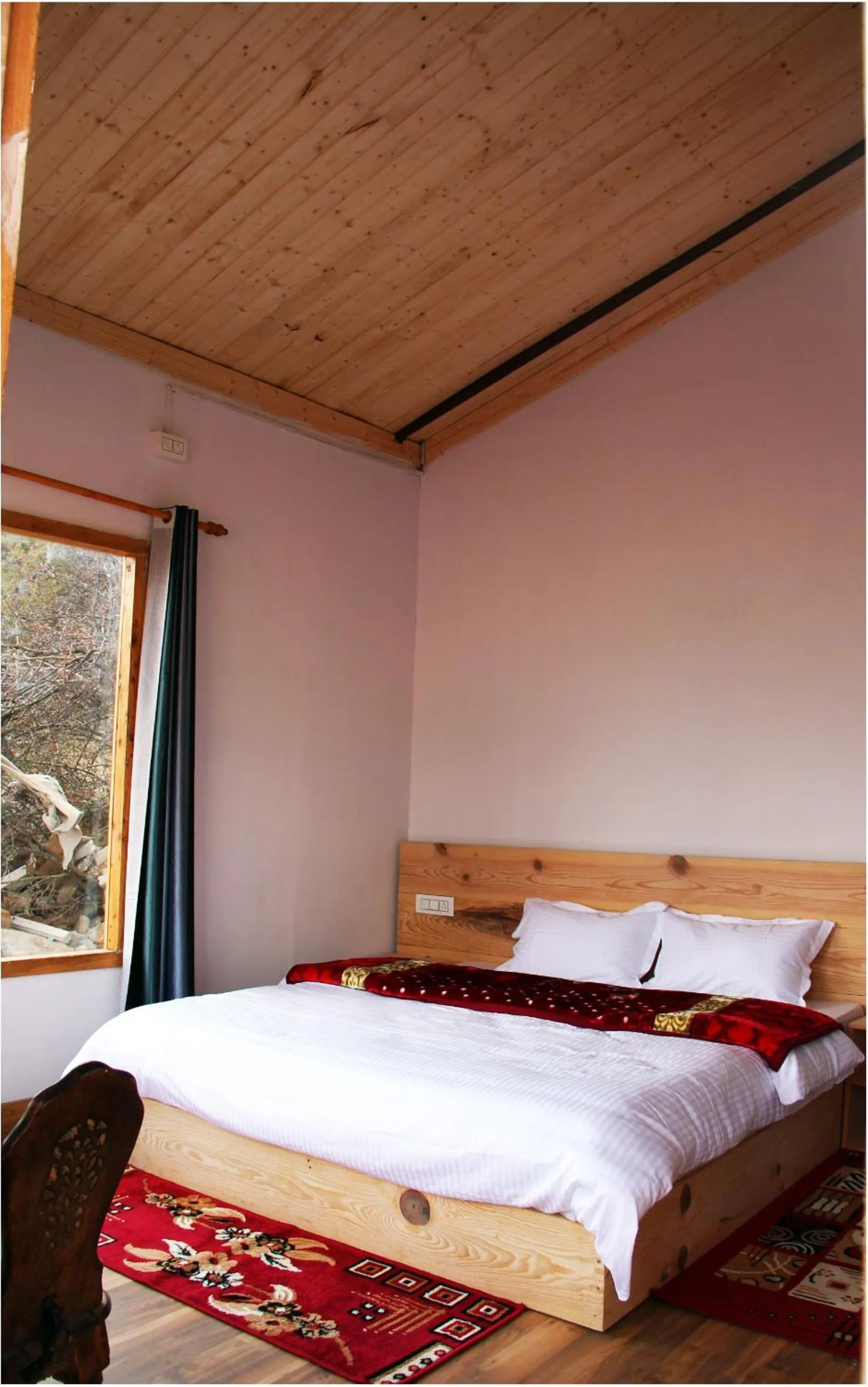 Bed in Mountain Rover Auli Resort