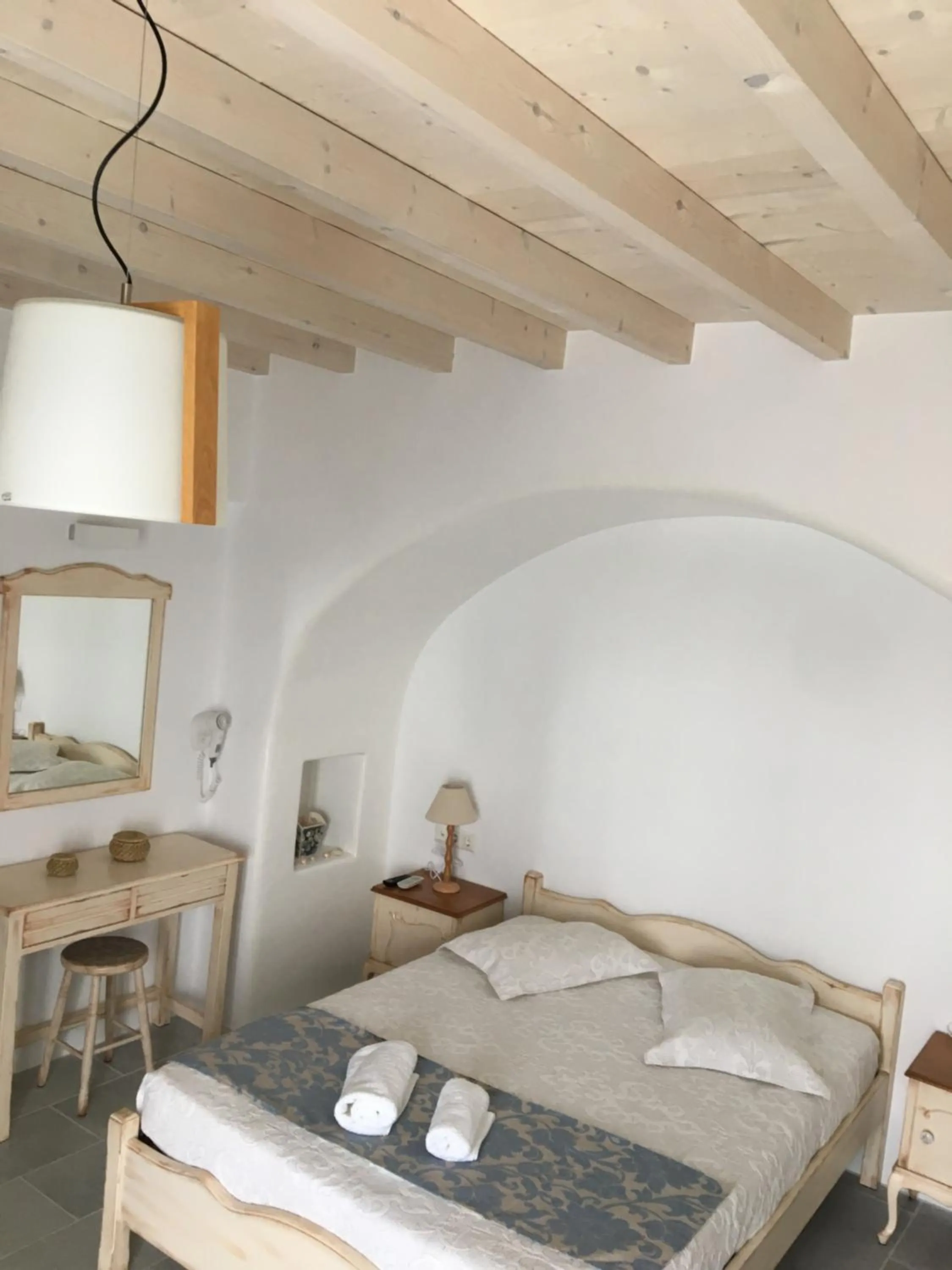 Bed in Aspasia Luxury Apartments