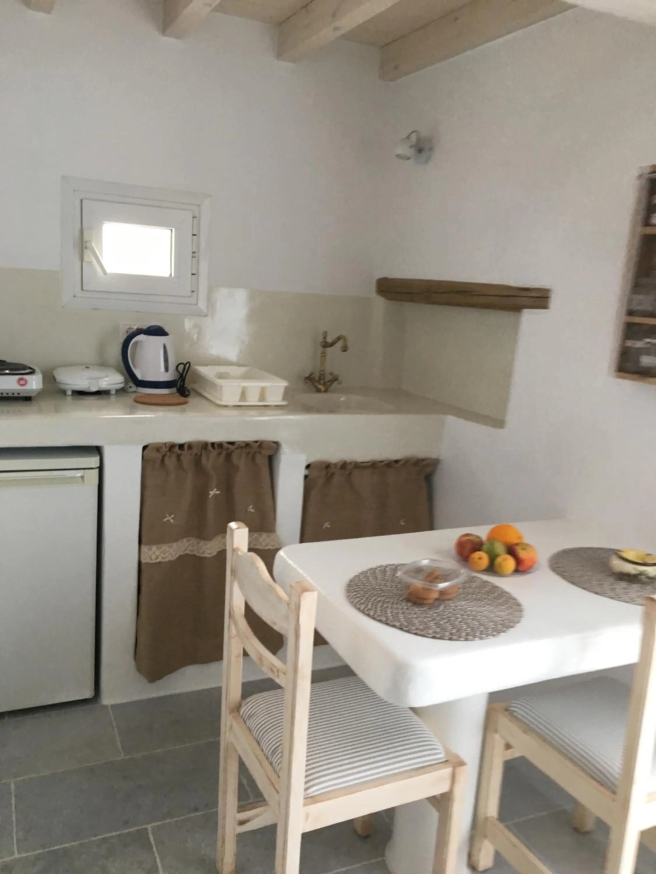 Dining area in Aspasia Luxury Apartments