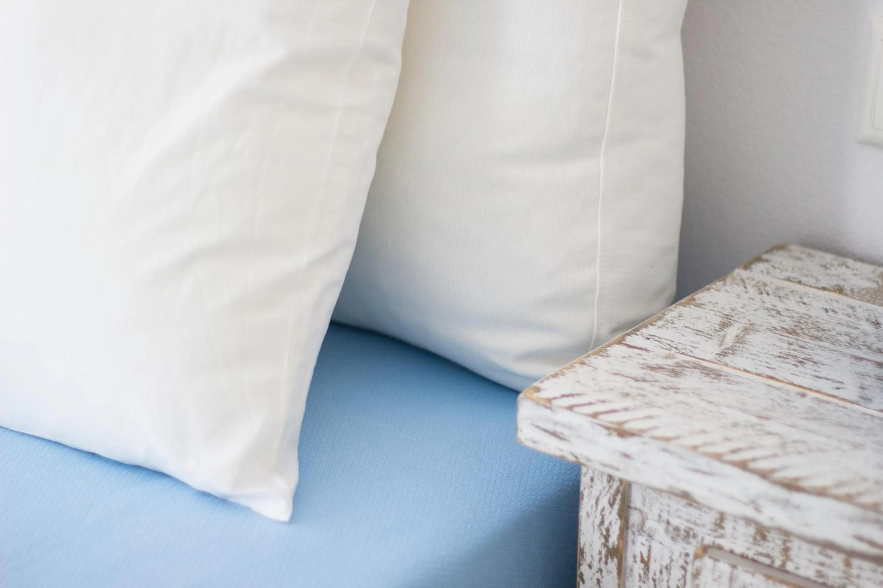 Decorative detail, Bed in Aspasia Luxury Apartments