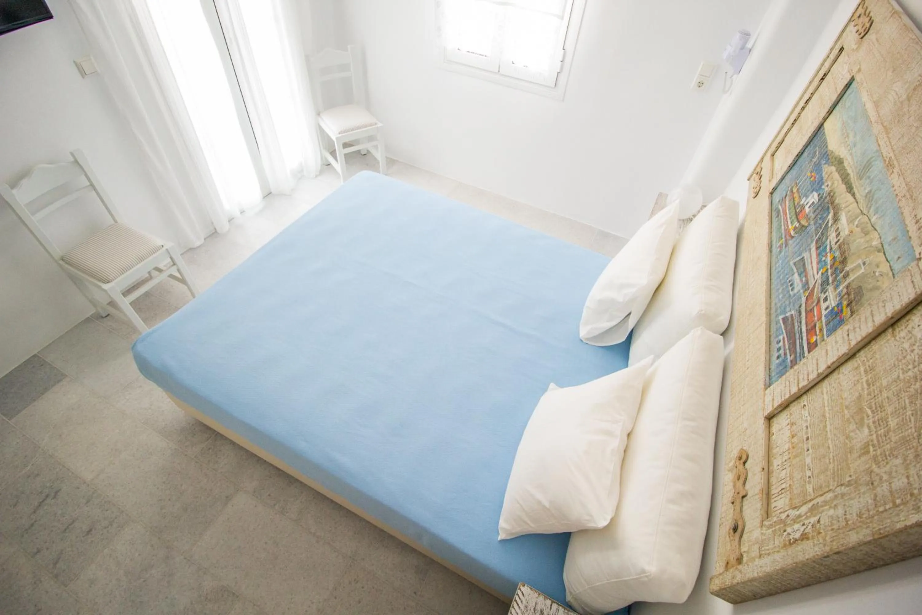 Bed in Aspasia Luxury Apartments