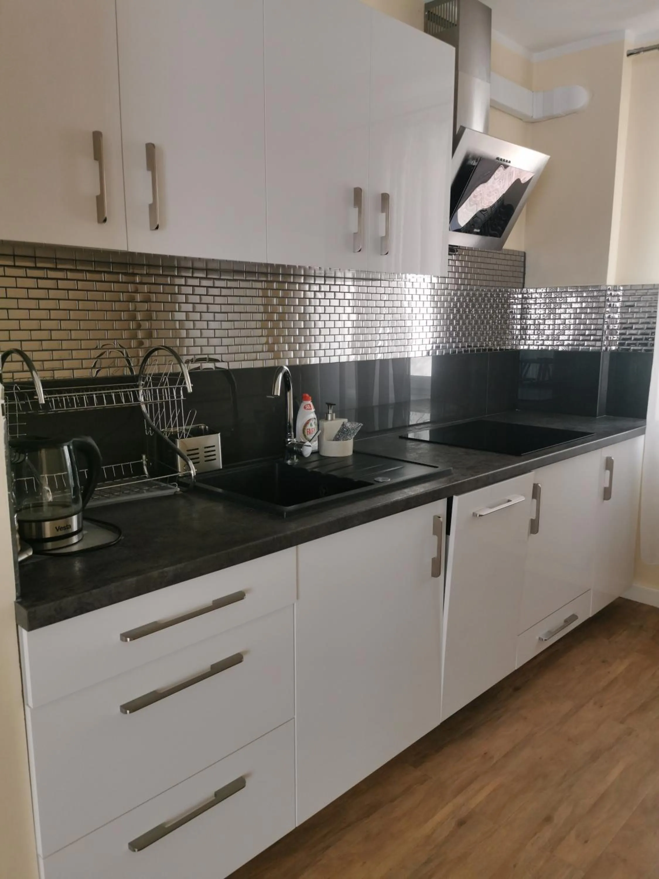 Kitchen or kitchenette in Lazur Apartamenty