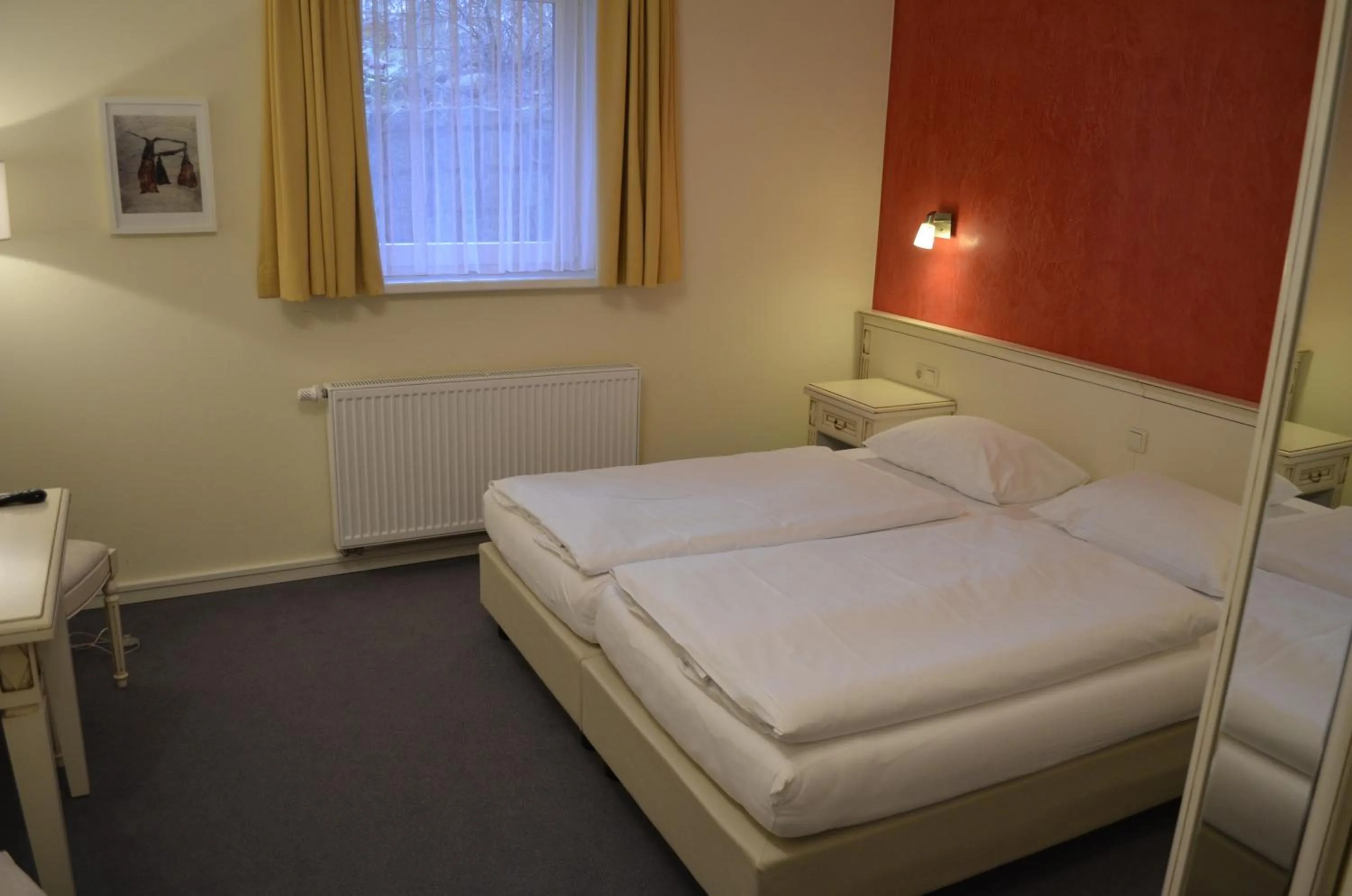 Bed in Hotel Pension Bellevue