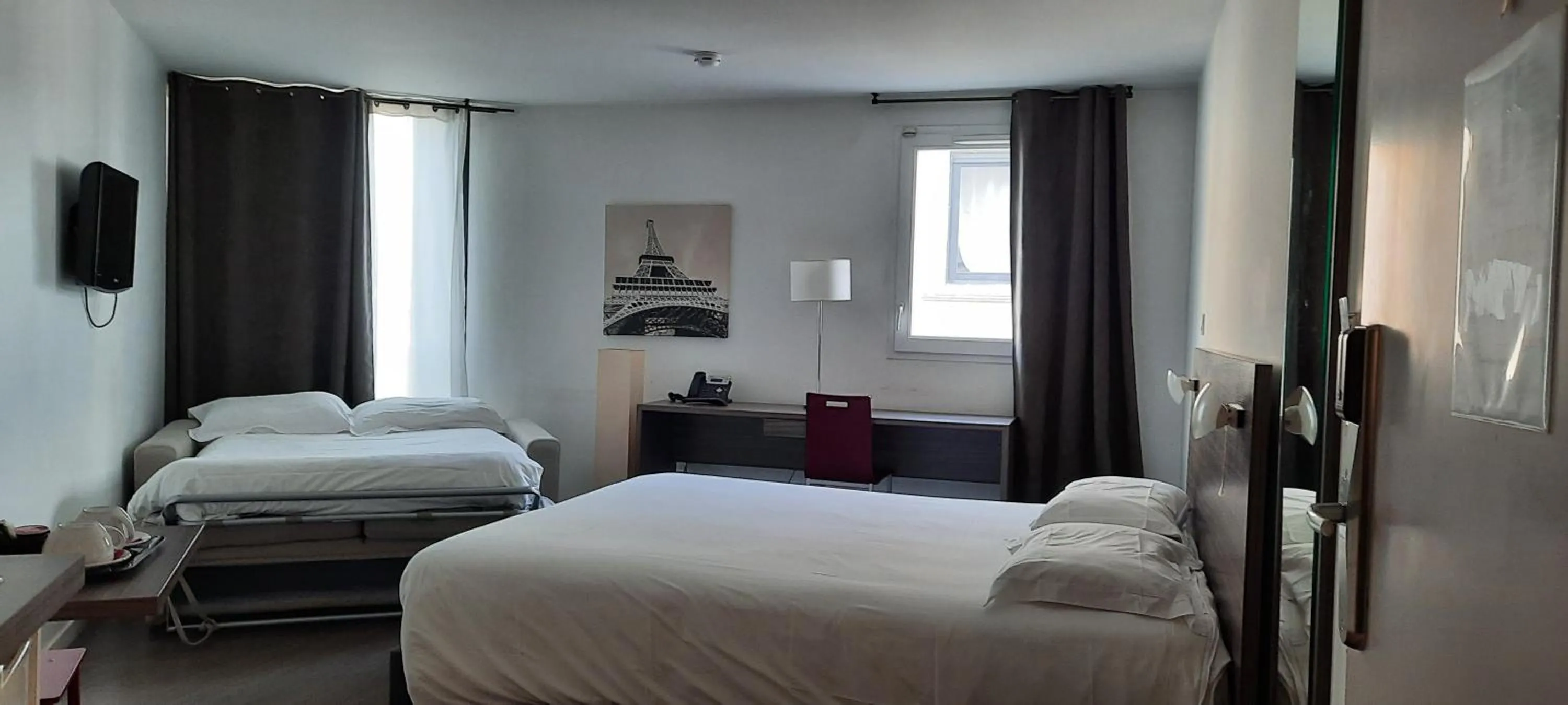 Kitchen or kitchenette, Bed in Appart’hôtel Hevea