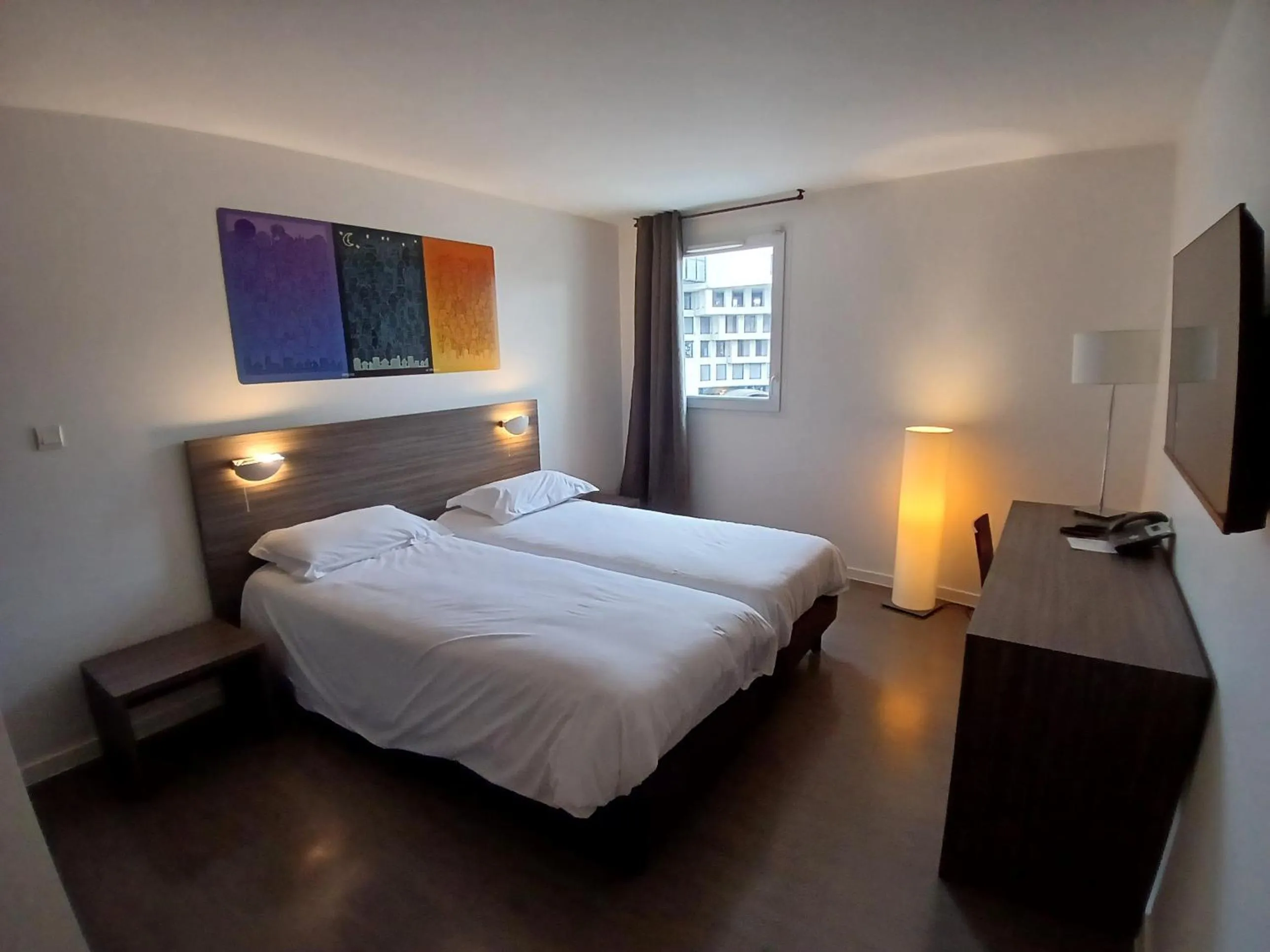 Kitchen or kitchenette, Bed in Appart’hôtel Hevea