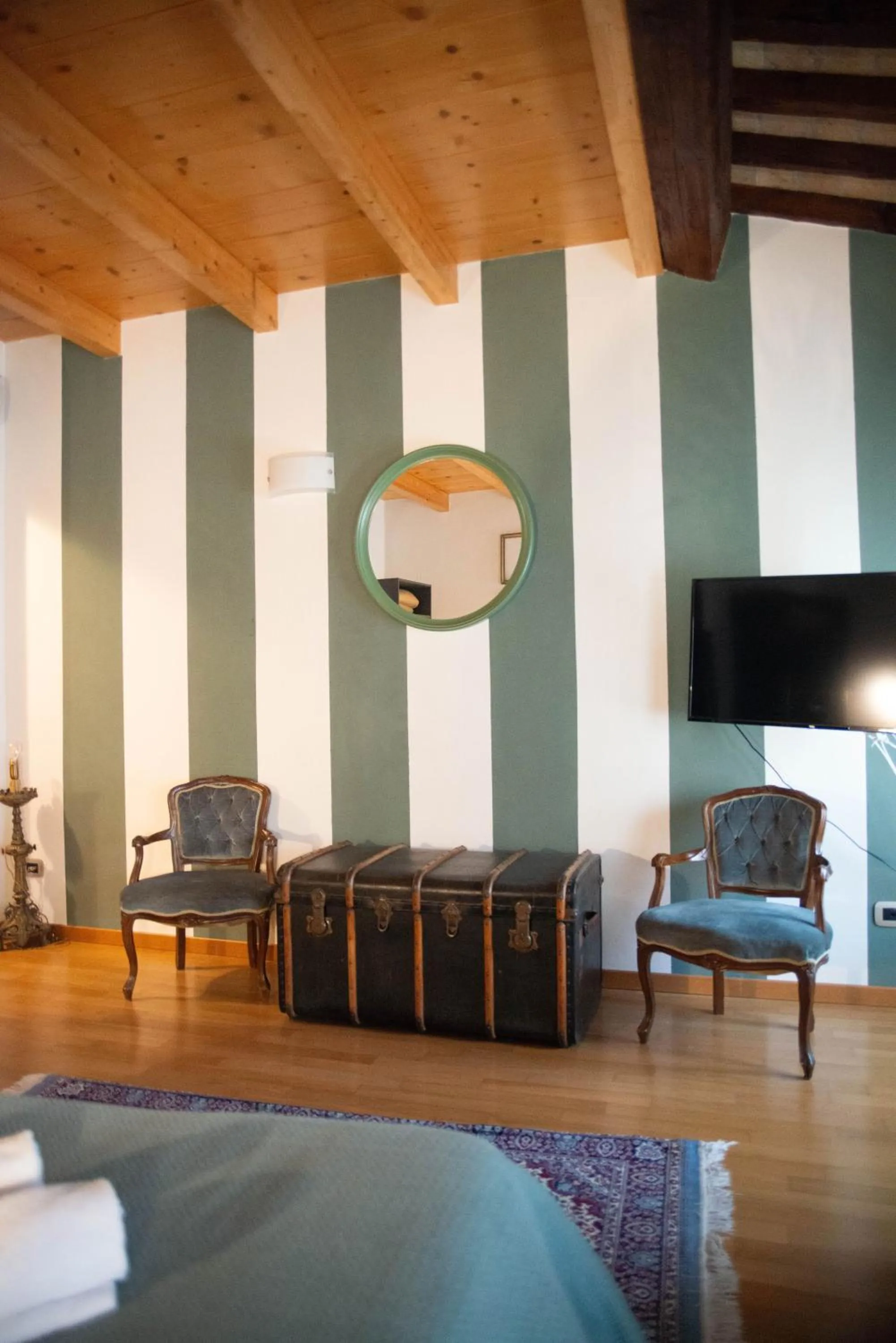 Communal lounge/ TV room in Pietra di Verona Residenza