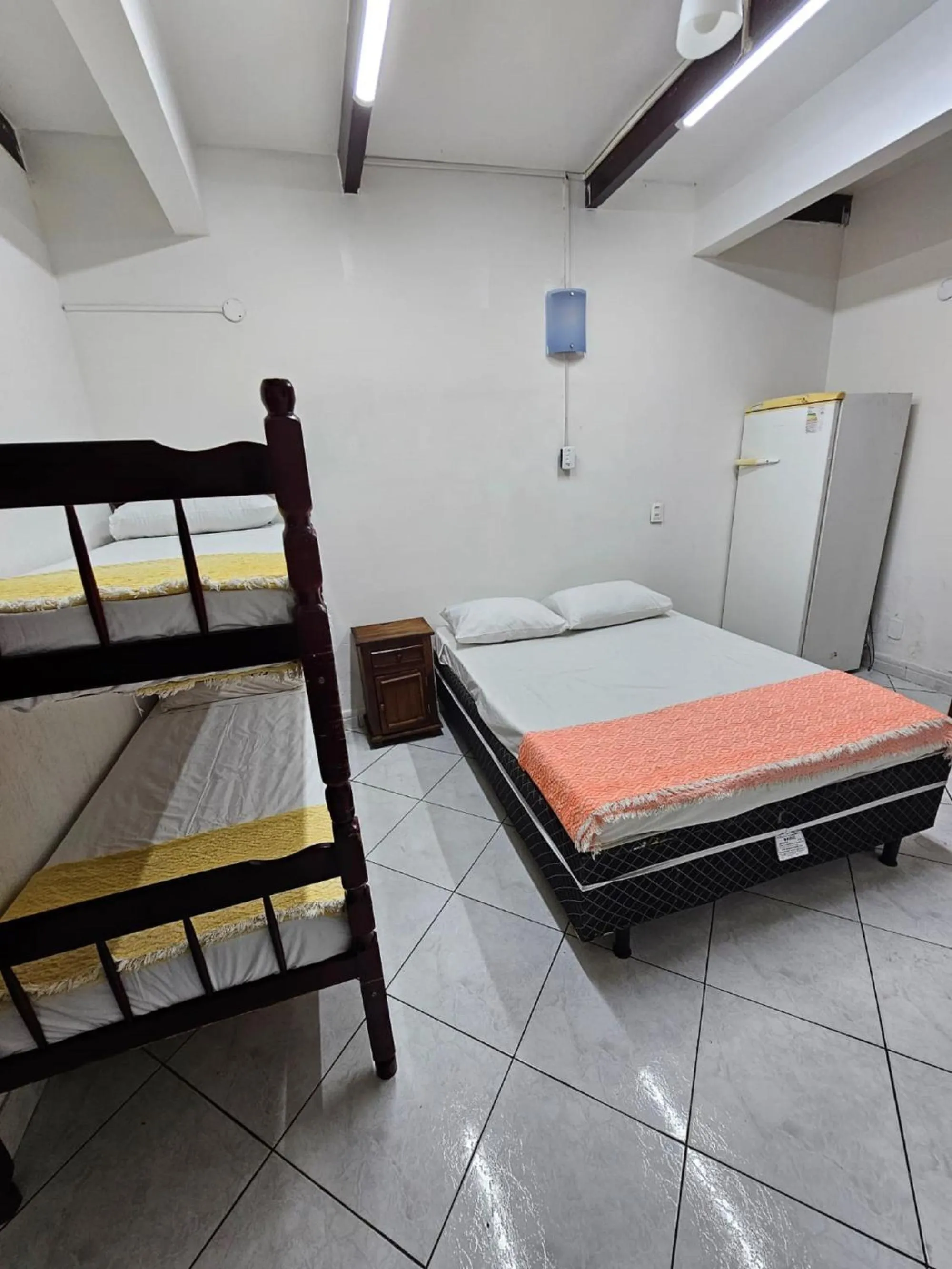 Bed in Pousada Casa da Pedra