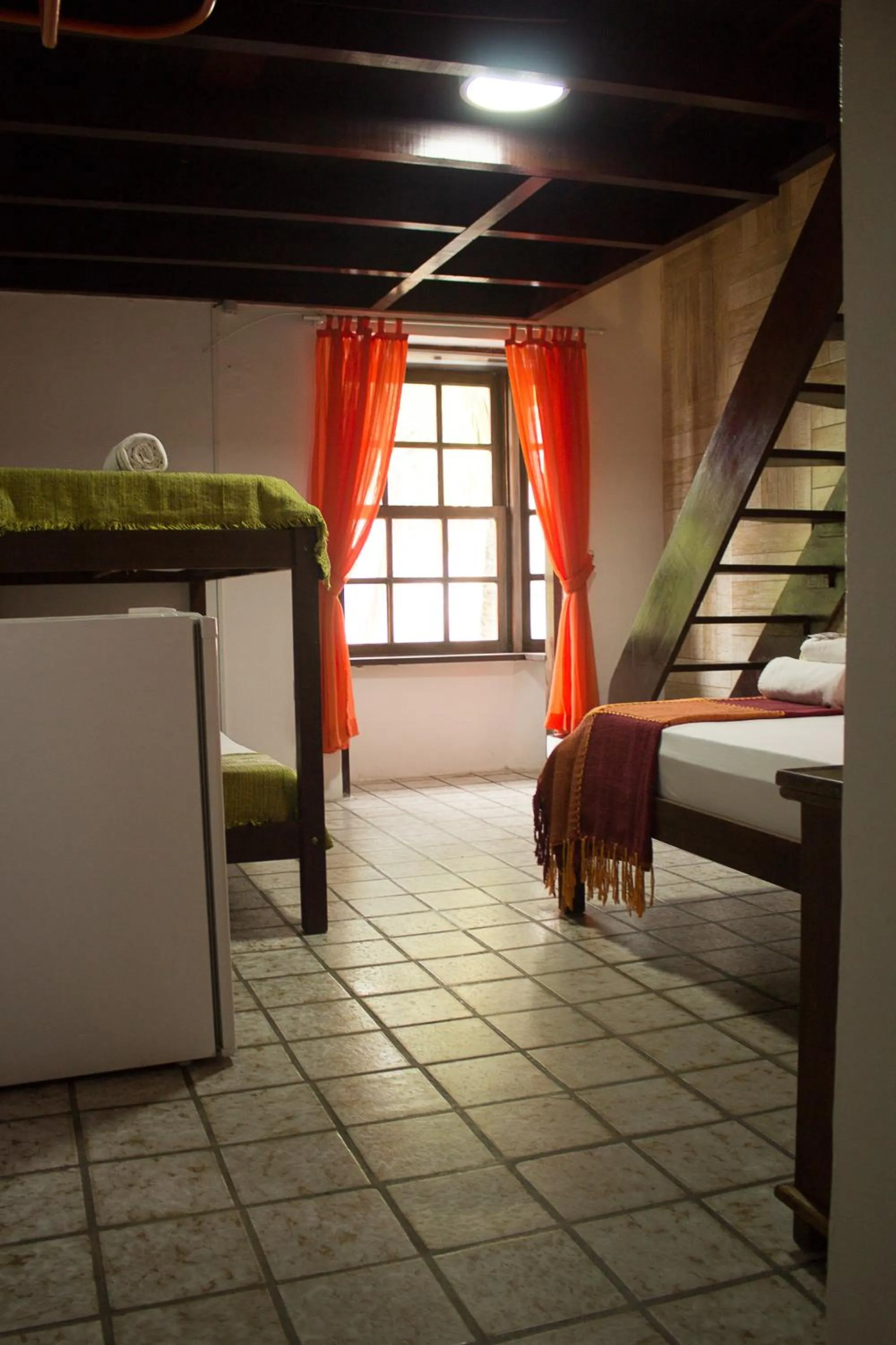 Bed in Pousada Casa da Pedra