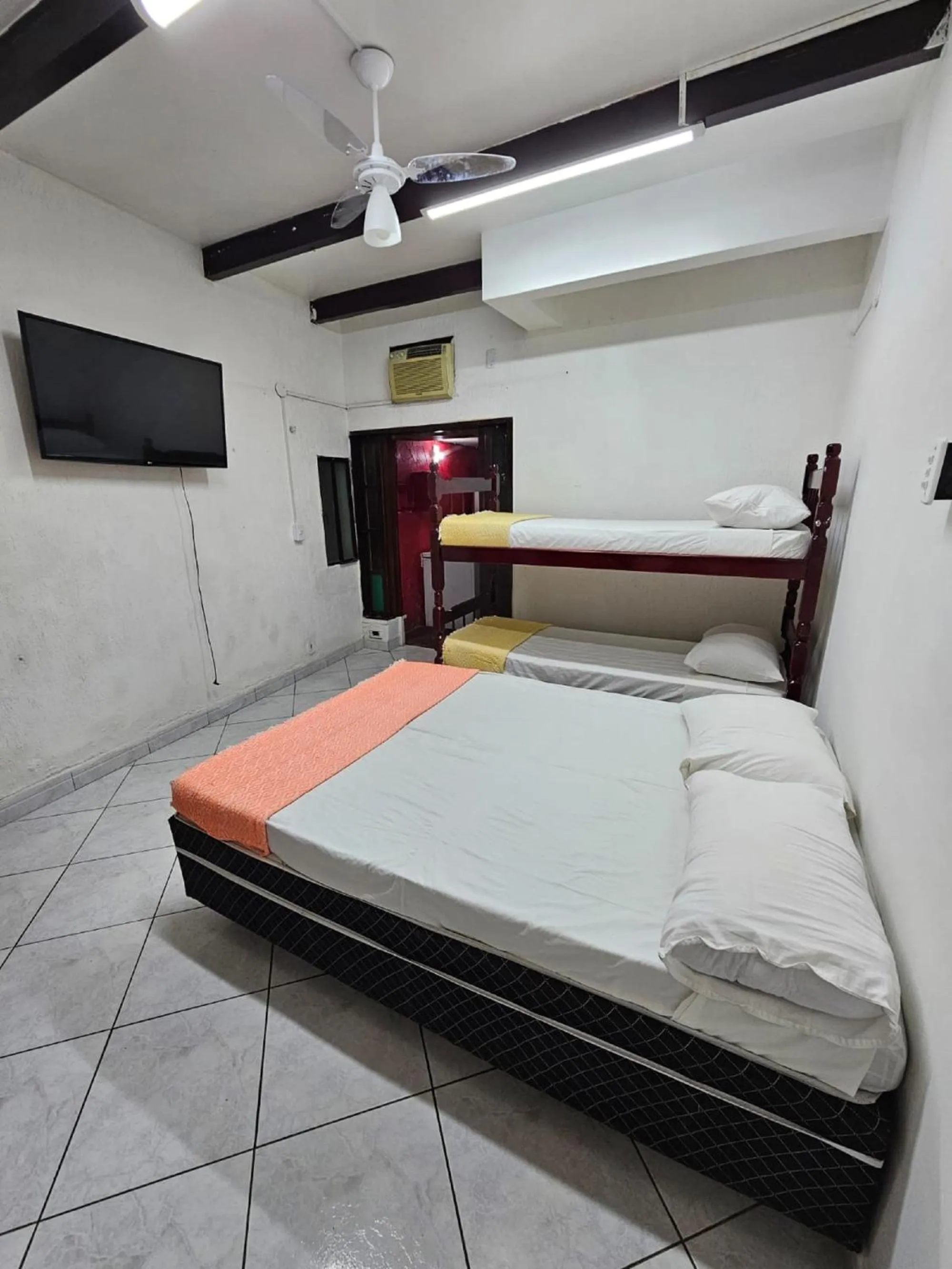 Bed in Pousada Casa da Pedra